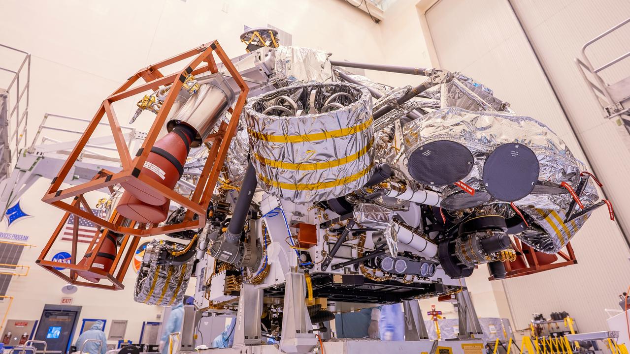 The Mars Perseverance rover is attached to its rocket-powered descent stage inside the Payload Hazardous Servicing Facility at NASA’s Kennedy Space Center in Florida on April 23, 2020. The rover and descent stage are the first spacecraft components to come together for launch — and they will be the last to separate when the spacecraft reaches Mars. At about 65 feet over the Martian surface, separation bolts will fire and the descent stage will lower Perseverance onto the Red Planet. Launch, aboard a United Launch Alliance Atlas V 541 rocket, is targeted between July 17 and Aug. 5 from Cape Canaveral Air Force Station. NASA’s Launch Services Program based at Kennedy is managing the launch.