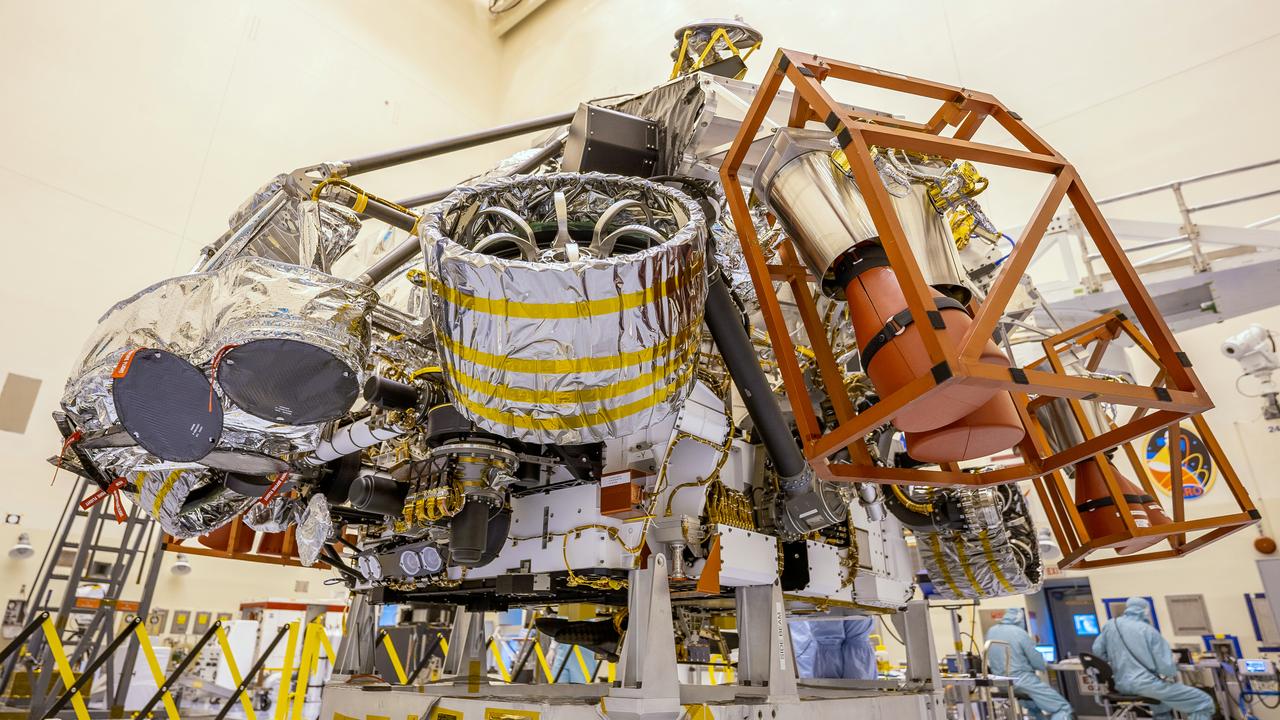 The Mars Perseverance rover is attached to its rocket-powered descent stage inside the Payload Hazardous Servicing Facility at NASA’s Kennedy Space Center in Florida on April 23, 2020. The rover and descent stage are the first spacecraft components to come together for launch — and they will be the last to separate when the spacecraft reaches Mars. At about 65 feet over the Martian surface, separation bolts will fire and the descent stage will lower Perseverance onto the Red Planet. Launch, aboard a United Launch Alliance Atlas V 541 rocket, is targeted between July 17 and Aug. 5 from Cape Canaveral Air Force Station. NASA’s Launch Services Program based at Kennedy is managing the launch.