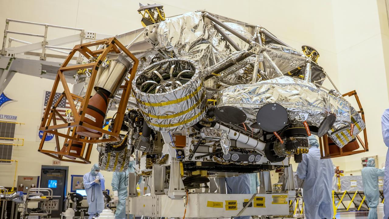 The Mars Perseverance rover is attached to its rocket-powered descent stage inside the Payload Hazardous Servicing Facility at NASA’s Kennedy Space Center in Florida on April 23, 2020. The rover and descent stage are the first spacecraft components to come together for launch — and they will be the last to separate when the spacecraft reaches Mars. At about 65 feet over the Martian surface, separation bolts will fire and the descent stage will lower Perseverance onto the Red Planet. Launch, aboard a United Launch Alliance Atlas V 541 rocket, is targeted between July 17 and Aug. 5 from Cape Canaveral Air Force Station. NASA’s Launch Services Program based at Kennedy is managing the launch.