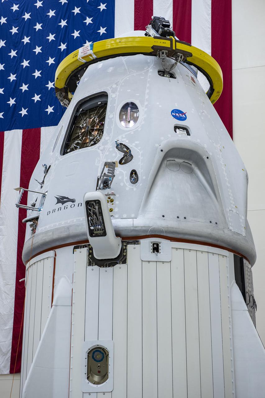 The SpaceX Crew Dragon trunk was secured to the spacecraft on Thursday, April 30, 2020, at Cape Canaveral Air Force Station, Florida, in preparation for the Demo-2 launch with NASA astronauts Robert Behnken and Douglas Hurley to the International Space Station for NASA’s Commercial Crew Program. Crew Dragon will carry Behnken and Hurley atop a Falcon 9 rocket, returning crew launches to the space station from U.S. soil for the first time since the Space Shuttle Program ended in 2011.