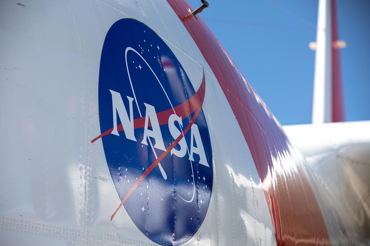 A close-up view of NASA’s C-130 aircraft that carries the Adaptive Caching Assembly (ACA) for NASA’s Mars Perseverance rover as it arrives at Kennedy Space Center’s Launch and Landing Facility in Florida on May 11, 2020. The ACA consists of seven motors and more than 3,000 parts, all working in unison to collect samples from the surface of Mars. A chief component of the assembly is the Sample Handling Arm, which will move sample tubes to the main robotic arm's coring drill and then transfer the filled sample tubes into a space to be sealed and stored. The Mars Perseverance rover is scheduled to launch in mid-July atop a United Launch Alliance Atlas V 541 rocket from Pad 41 at nearby Cape Canaveral Air Force Station. The rover is part of NASA’s Mars Exploration Program, a long-term effort of robotic exploration of the Red Planet. The rover will search for habitable conditions in the ancient past and signs of past microbial life on Mars. The Launch Services Program at Kennedy is responsible for launch management. 