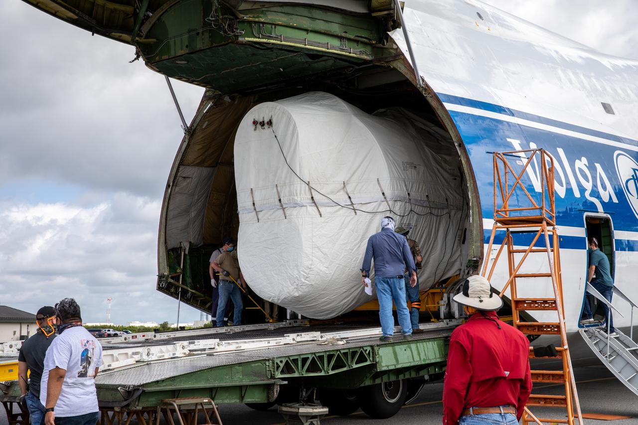 Preparations are underway to offload the United Launch Alliance booster for NASA’s Mars Perseverance rover from the Antonov 124 cargo aircraft at the Skid Strip at Cape Canaveral Air Force Station (CCAFS) in Florida on May 19, 2020. The Mars Perseverance rover is scheduled to launch in mid-July atop a United Launch Alliance Atlas V 541 rocket from Pad 41 at CCAFS. The rover is part of NASA’s Mars Exploration Program, a long-term effort of robotic exploration of the Red Planet. The rover will search for habitable conditions in the ancient past and signs of past microbial life on Mars. The Launch Services Program at Kennedy is responsible for launch management.