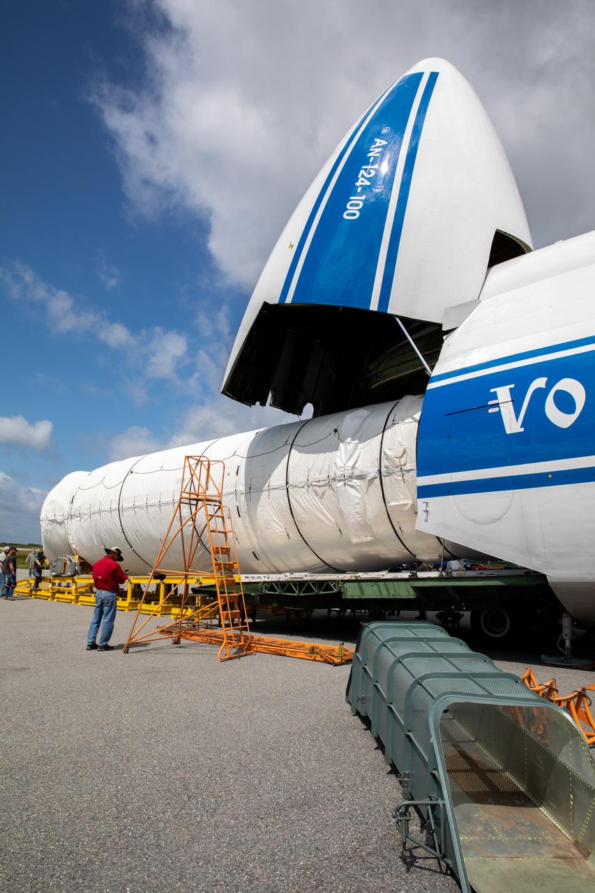 The United Launch Alliance booster for NASA’s Mars Perseverance rover is offloaded from the Antonov 124 cargo aircraft at the Skid Strip at Cape Canaveral Air Force Station (CCAFS) in Florida on May 19, 2020. The Mars Perseverance rover is scheduled to launch in mid-July atop a United Launch Alliance Atlas V 541 rocket from Pad 41 at CCAFS. The rover is part of NASA’s Mars Exploration Program, a long-term effort of robotic exploration of the Red Planet. The rover will search for habitable conditions in the ancient past and signs of past microbial life on Mars. The Launch Services Program at Kennedy is responsible for launch management.