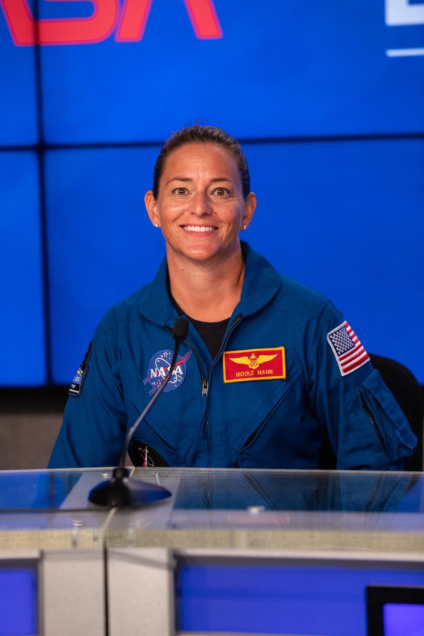 NASA astronaut Nicole Mann participates in a press briefing inside the Press Site auditorium on May 26, 2020, at the agency’s Kennedy Space Center in Florida ahead of NASA’s SpaceX Demo-2 launch, slated for Wednesday, May 27. A SpaceX Falcon 9 rocket and Crew Dragon spacecraft are scheduled to lift off from Kennedy’s Launch Complex 39A, carrying NASA astronauts Robert Behnken and Douglas Hurley to the International Space Station. This will mark the first launch of astronauts from U.S. soil to the space station since the conclusion of the Space Shuttle Program in 2011. Part of the agency’s Commercial Crew Program, this will be SpaceX’s final flight test, paving the way for NASA to certify the crew transportation system for regular, crewed flights to the orbiting laboratory. Liftoff is scheduled for 4:33 p.m. EDT.