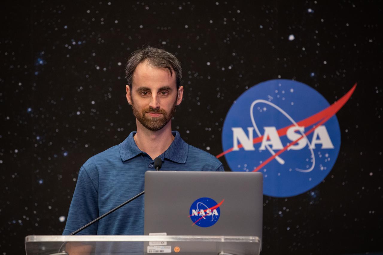 Joshua Santora, with NASA Communications, moderates a NASA Social Facebook Live briefing inside the Press Site auditorium on May 26, 2020, at the agency’s Kennedy Space Center in Florida ahead of NASA’s SpaceX Demo-2 launch, slated for Wednesday, May 27. A SpaceX Falcon 9 rocket and Crew Dragon spacecraft are scheduled to lift off from Kennedy’s Launch Complex 39A, carrying NASA astronauts Robert Behnken and Douglas Hurley to the International Space Station. This will mark the first launch of astronauts from U.S. soil to the space station since the conclusion of the Space Shuttle Program in 2011. Part of the agency’s Commercial Crew Program, this will be SpaceX’s final flight test, paving the way for NASA to certify the crew transportation system for regular, crewed flights to the orbiting laboratory. Liftoff is scheduled for 4:33 p.m. EDT.