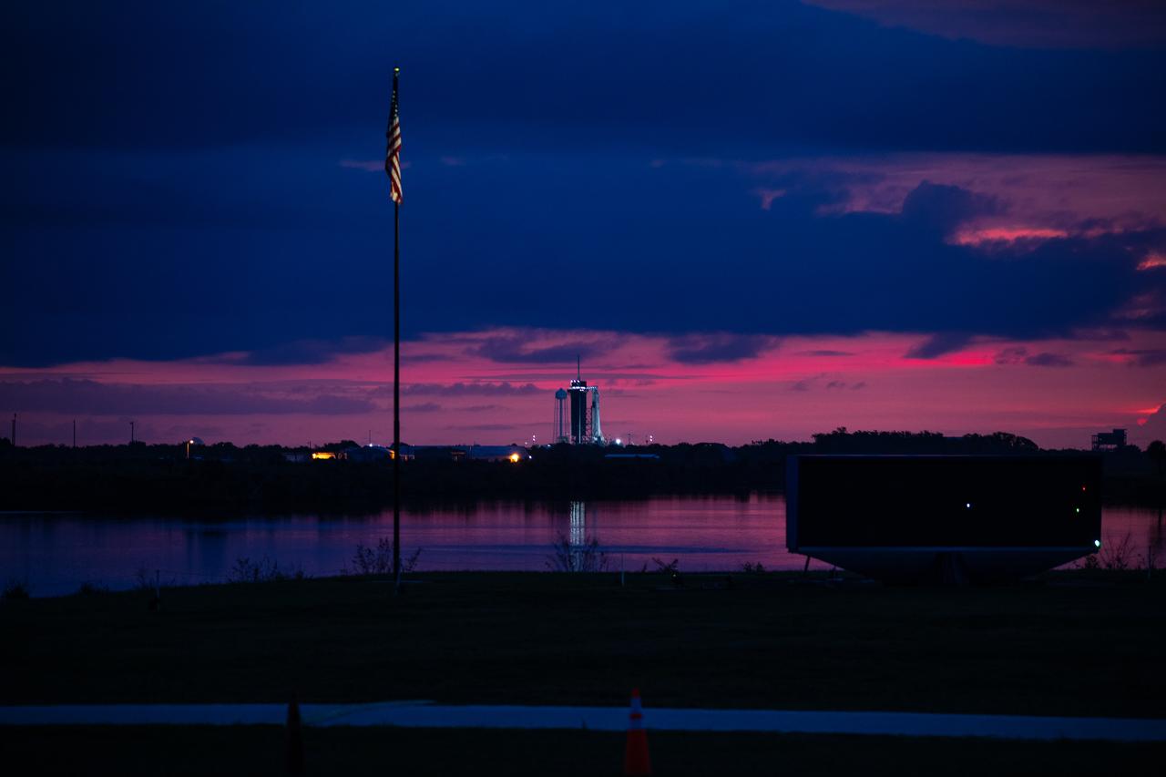 A colorful sunrise marks the dawn of a new era in human spaceflight ahead of NASA’s SpaceX Demo-2 mission, as the SpaceX Falcon 9 rocket and Crew Dragon spacecraft stand ready for launch at NASA’s Kennedy Space Center in Florida on May 29, 2020. The rocket and spacecraft lifted off from historic Launch Complex 39A at 3:22 p.m. EDT on May 30, carrying NASA astronauts Robert Behnken and Douglas Hurley to the International Space Station as part of the agency’s Commercial Crew Program, returning human spaceflight capability to the U.S. after nearly a decade. Demo-2 is SpaceX’s final flight test, paving the way for NASA to certify the crew transportation system for regular, crewed flights to the orbiting laboratory.