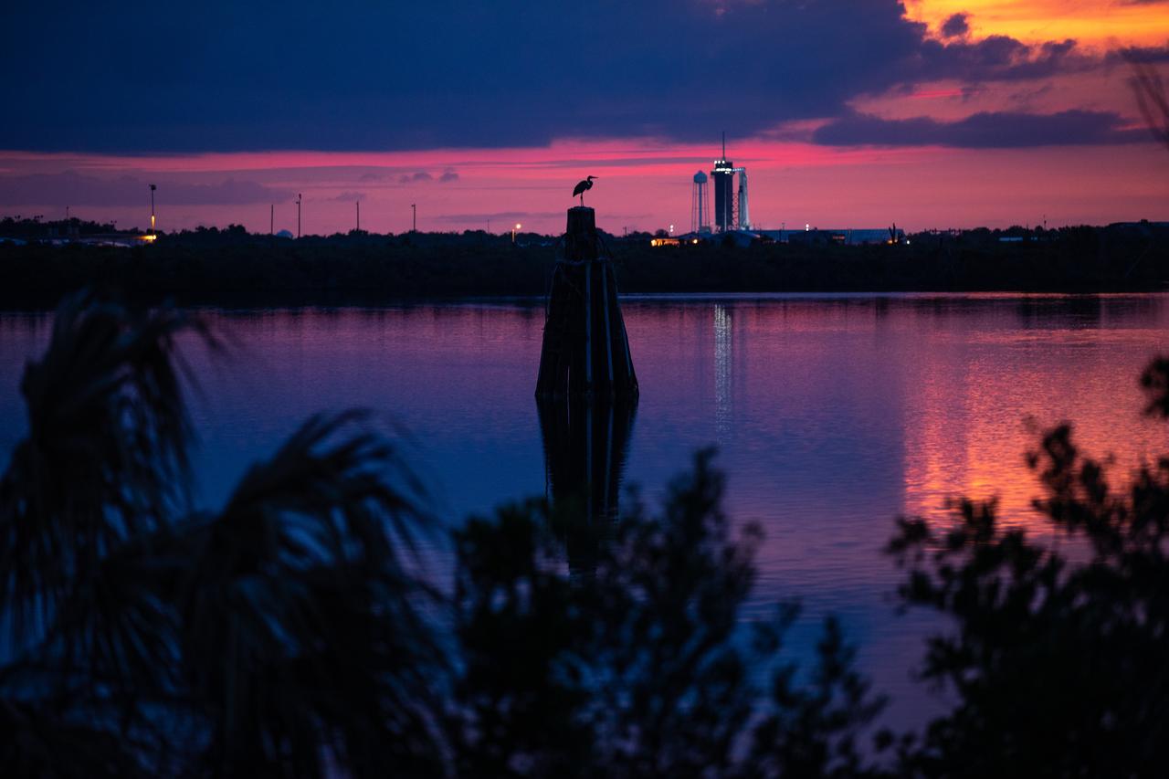 A colorful sunrise marks the dawn of a new era in human spaceflight ahead of NASA’s SpaceX Demo-2 mission, as the SpaceX Falcon 9 rocket and Crew Dragon spacecraft stand ready for launch at NASA’s Kennedy Space Center in Florida on May 29, 2020. The rocket and spacecraft lifted off from historic Launch Complex 39A at 3:22 p.m. EDT on May 30, carrying NASA astronauts Robert Behnken and Douglas Hurley to the International Space Station as part of the agency’s Commercial Crew Program, returning human spaceflight capability to the U.S. after nearly a decade. Demo-2 is SpaceX’s final flight test, paving the way for NASA to certify the crew transportation system for regular, crewed flights to the orbiting laboratory.