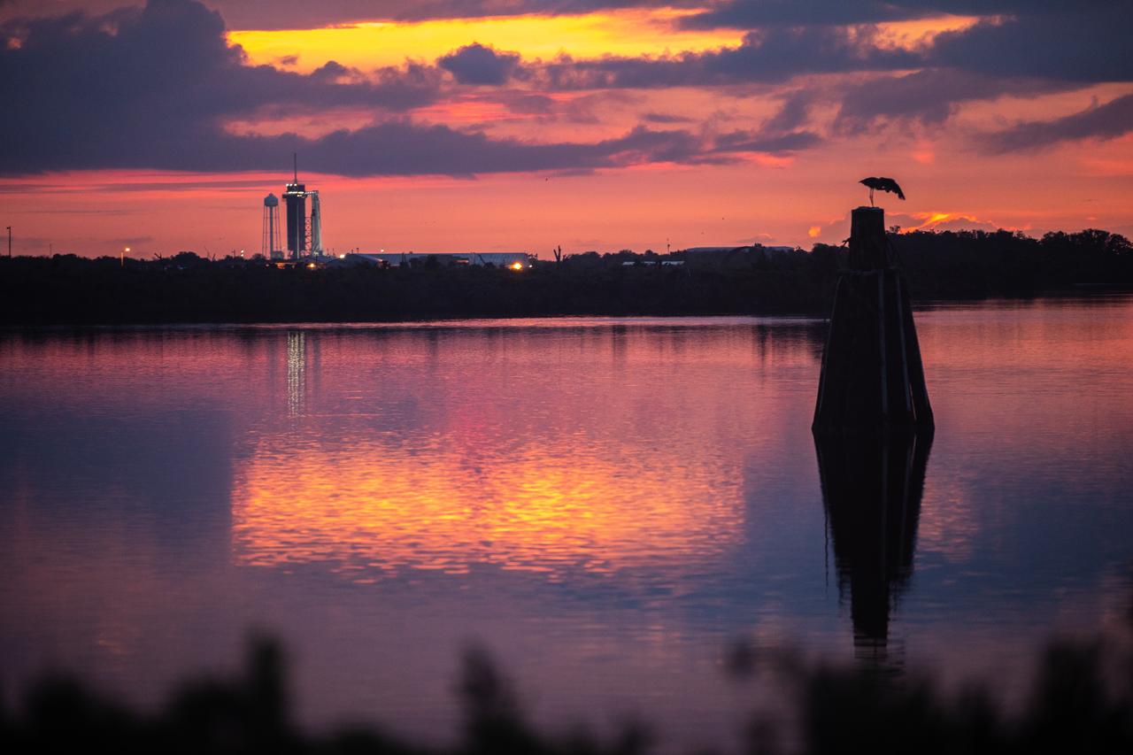 A colorful sunrise marks the dawn of a new era in human spaceflight ahead of NASA’s SpaceX Demo-2 mission, as the SpaceX Falcon 9 rocket and Crew Dragon spacecraft stand ready for launch at NASA’s Kennedy Space Center in Florida on May 29, 2020. The rocket and spacecraft lifted off from historic Launch Complex 39A at 3:22 p.m. EDT on May 30, carrying NASA astronauts Robert Behnken and Douglas Hurley to the International Space Station as part of the agency’s Commercial Crew Program, returning human spaceflight capability to the U.S. after nearly a decade. Demo-2 is SpaceX’s final flight test, paving the way for NASA to certify the crew transportation system for regular, crewed flights to the orbiting laboratory.