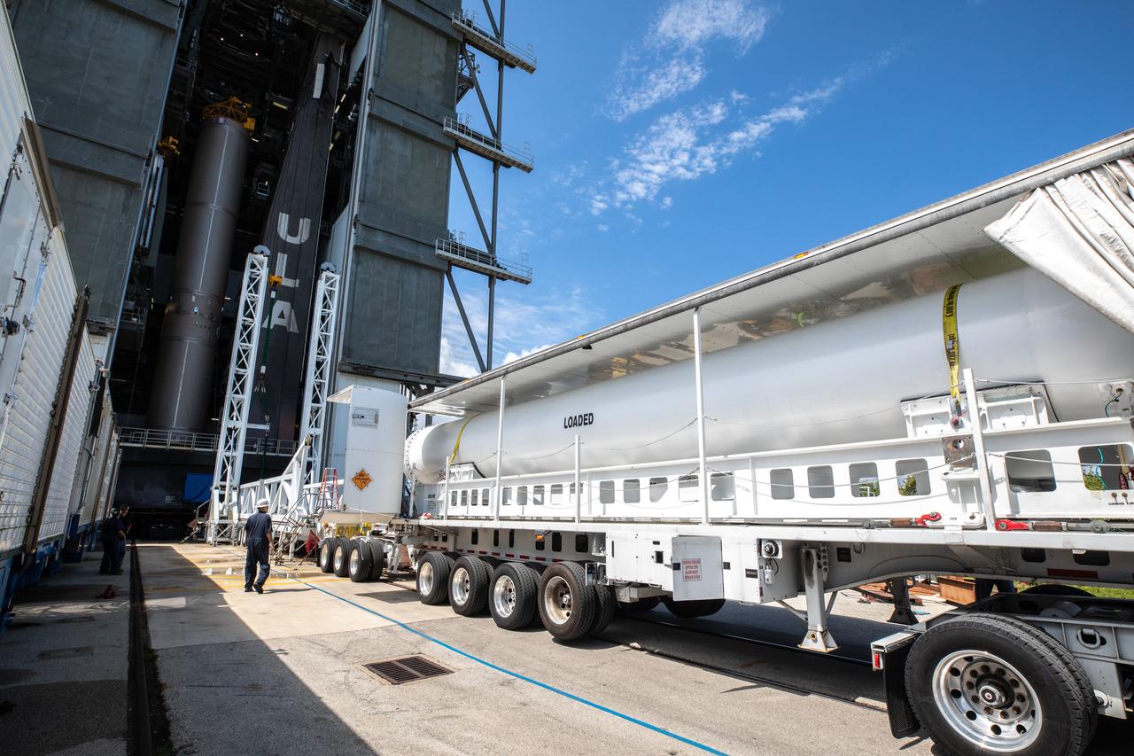The first solid rocket booster (SRB) for the United Launch Alliance Atlas V 541 rocket for NASA’s Mars 2020 mission with the Perseverance rover arrives at the Vertical Integration Facility (VIF) at Space Launch Complex 41 at Cape Canaveral Air Force Station (CCAFS) in Florida on May 29, 2020. The SRB will be prepared for lift and mating to the Atlas V booster in the VIF. The Mars Perseverance rover is scheduled to launch in mid-July atop the Atlas V rocket from Pad 41. The rover is part of NASA’s Mars Exploration Program, a long-term effort of robotic exploration of the Red Planet. The rover will search for habitable conditions in the ancient past and signs of past microbial life on Mars. The Launch Services Program at Kennedy is responsible for launch management.