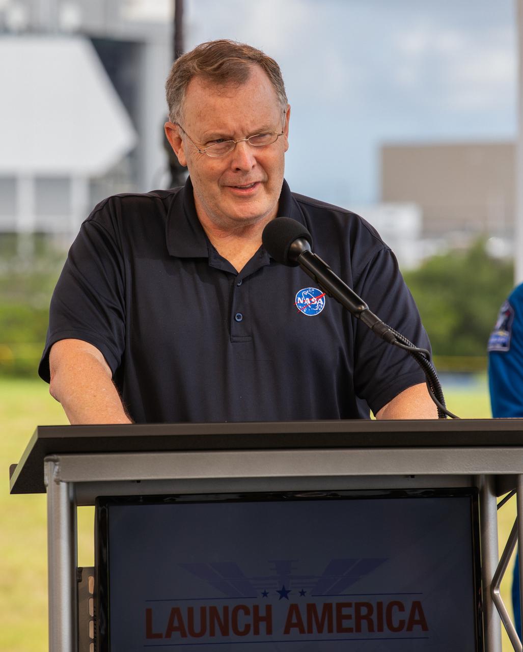 NASA Deputy Administrator Jim Morhard speaks to members of the media during a press briefing May 29, 2020, near the Press Site countdown clock at the agency’s Kennedy Space Center in Florida ahead of NASA’s SpaceX Demo-2 launch. The launch, initially scheduled for May 27, was scrubbed due to unfavorable weather conditions. The next launch attempt is Saturday, May 30. A SpaceX Falcon 9 rocket and Crew Dragon spacecraft are scheduled to lift off from Kennedy’s Launch Complex 39A, carrying NASA astronauts Robert Behnken and Douglas Hurley to the International Space Station. This will mark the first launch of astronauts from U.S. soil to the space station since the conclusion of the Space Shuttle Program in 2011. Part of the agency’s Commercial Crew Program, this will be SpaceX’s final flight test, paving the way for NASA to certify the crew transportation system for regular, crewed flights to the orbiting laboratory. Liftoff is scheduled for 3:22 p.m. EDT.