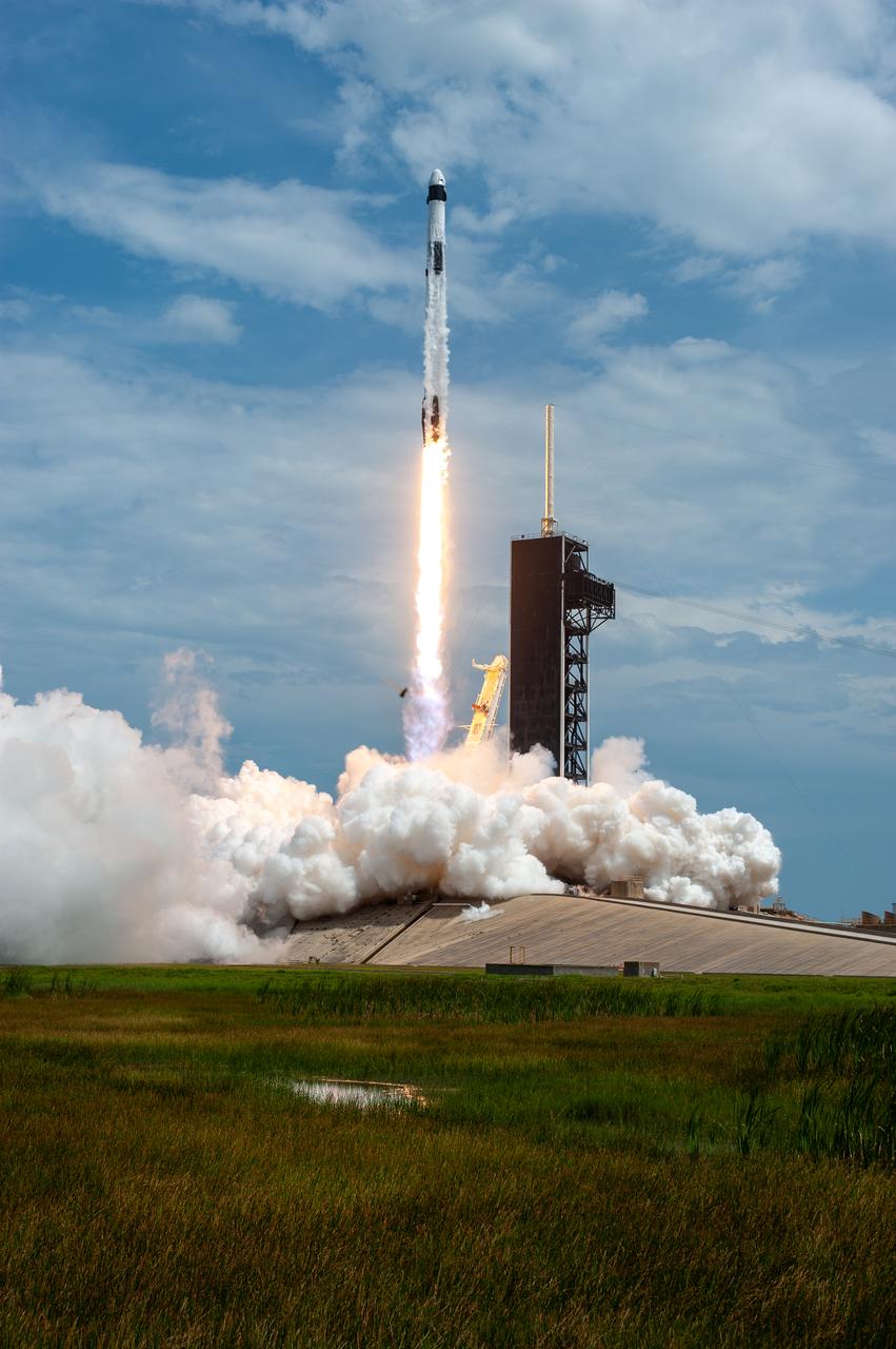 A SpaceX Falcon 9 rocket soars upward after lifting off from historic Launch Complex 39A at NASA’s Kennedy Space Center in Florida on May 30, 2020, carrying NASA astronauts Robert Behnken and Douglas Hurley to the International Space Station in a SpaceX Crew Dragon capsule for the agency’s SpaceX Demo-2 mission. Liftoff occurred at 3:22 p.m. EDT. Behnken and Hurley are the first astronauts to launch from U.S. soil to the space station since the end of the Space Shuttle Program in 2011. Part of NASA’s Commercial Crew Program, this will be SpaceX’s final flight test, paving the way for the agency to certify the crew transportation system for regular, crewed flights to the orbiting laboratory.