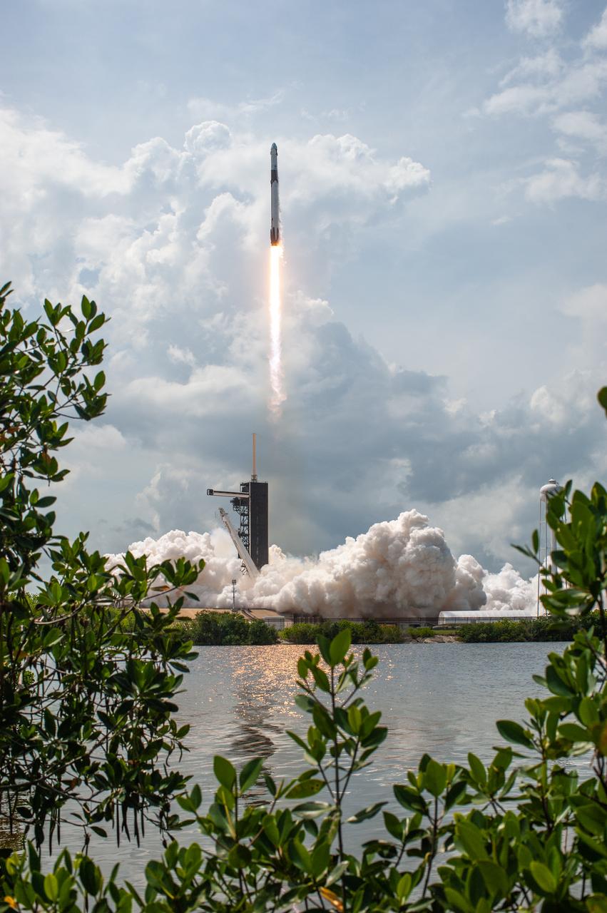 A SpaceX Falcon 9 rocket soars upward after lifting off from historic Launch Complex 39A at NASA’s Kennedy Space Center in Florida on May 30, 2020, carrying NASA astronauts Robert Behnken and Douglas Hurley to the International Space Station in a SpaceX Crew Dragon capsule for the agency’s SpaceX Demo-2 mission. Liftoff occurred at 3:22 p.m. EDT. Behnken and Hurley are the first astronauts to launch from U.S. soil to the space station since the end of the Space Shuttle Program in 2011. Part of NASA’s Commercial Crew Program, this will be SpaceX’s final flight test, paving the way for the agency to certify the crew transportation system for regular, crewed flights to the orbiting laboratory.