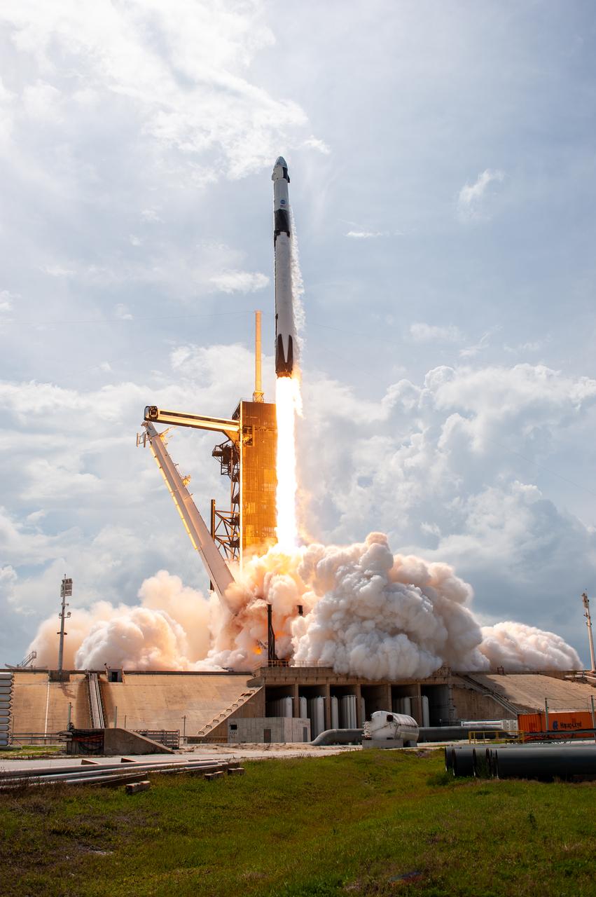 A SpaceX Falcon 9 rocket soars upward after lifting off from historic Launch Complex 39A at NASA’s Kennedy Space Center in Florida on May 30, 2020, carrying NASA astronauts Robert Behnken and Douglas Hurley to the International Space Station in a SpaceX Crew Dragon capsule for the agency’s SpaceX Demo-2 mission. Liftoff occurred at 3:22 p.m. EDT. Behnken and Hurley are the first astronauts to launch from U.S. soil to the space station since the end of the Space Shuttle Program in 2011. Part of NASA’s Commercial Crew Program, this will be SpaceX’s final flight test, paving the way for the agency to certify the crew transportation system for regular, crewed flights to the orbiting laboratory.
