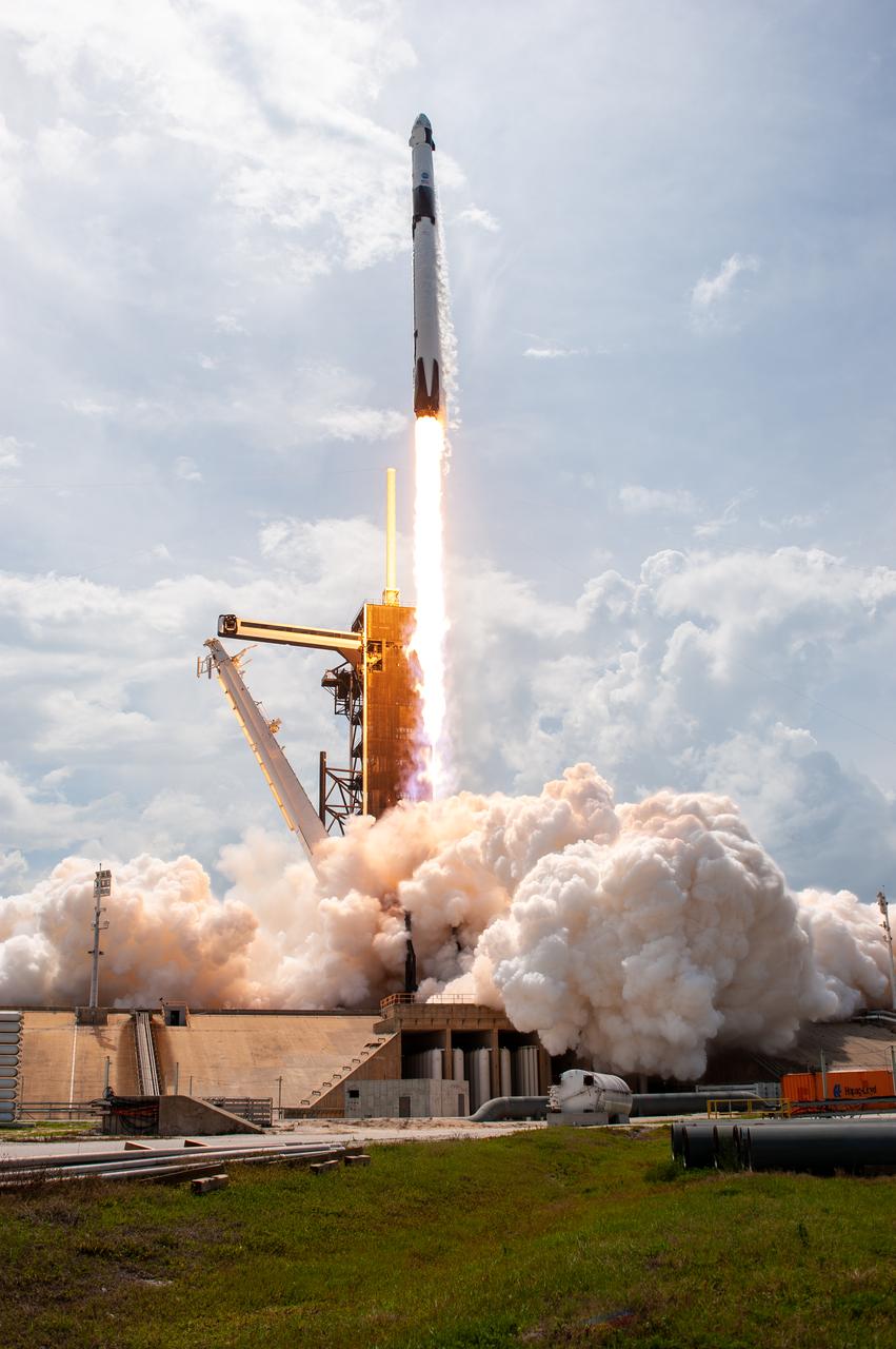 A SpaceX Falcon 9 rocket soars upward after lifting off from historic Launch Complex 39A at NASA’s Kennedy Space Center in Florida on May 30, 2020, carrying NASA astronauts Robert Behnken and Douglas Hurley to the International Space Station in a SpaceX Crew Dragon capsule for the agency’s SpaceX Demo-2 mission. Liftoff occurred at 3:22 p.m. EDT. Behnken and Hurley are the first astronauts to launch from U.S. soil to the space station since the end of the Space Shuttle Program in 2011. Part of NASA’s Commercial Crew Program, this will be SpaceX’s final flight test, paving the way for the agency to certify the crew transportation system for regular, crewed flights to the orbiting laboratory.