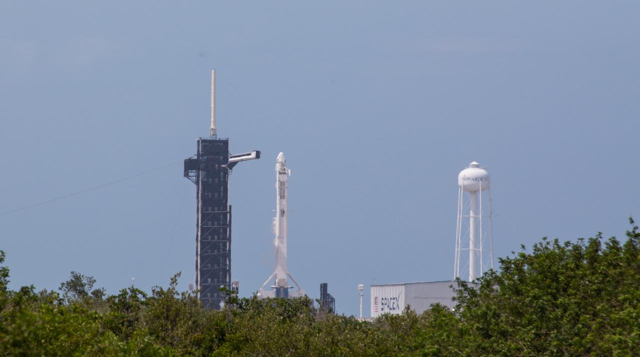 A SpaceX Falcon 9 rocket and Crew Dragon spacecraft stand poised for launch at historic Launch Complex 39A at NASA’s Kennedy Space Center in Florida on May 30, 2020, ahead of the agency’s SpaceX Demo-2 mission to the International Space Station. Liftoff occurred at 3:22 p.m. EDT. NASA astronauts Robert Behnken and Douglas Hurley are the first astronauts to launch from U.S. soil to the space station since the end of the Space Shuttle Program in 2011. Part of NASA’s Commercial Crew Program, this will be SpaceX’s final flight test, paving the way for the agency to certify the crew transportation system for regular, crewed flights to the orbiting laboratory.