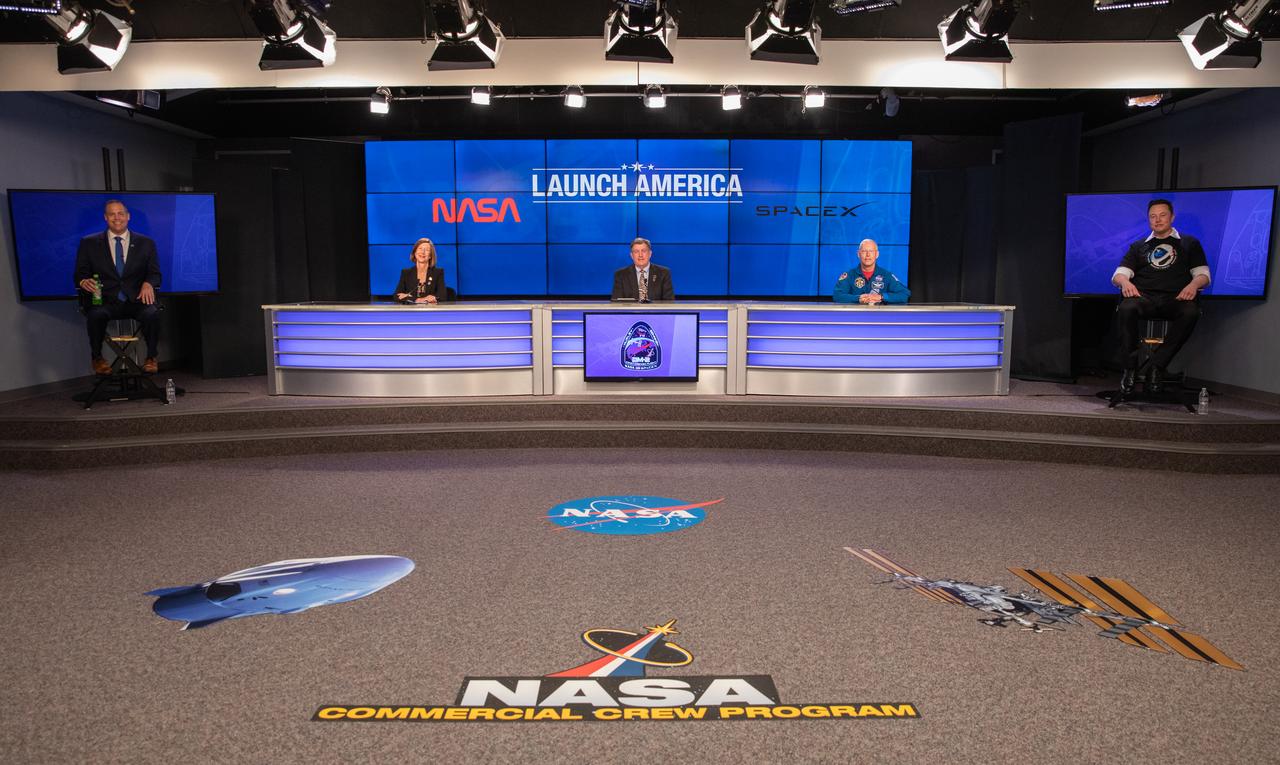 Inside the Press Site auditorium at NASA’s Kennedy Space Center in Florida, NASA and SpaceX officials conduct a postlaunch news conference on May 30, 2020, following the launch of the agency’s SpaceX Demo-2 mission to the International Space Station. From left are: NASA Administrator Jim Bridenstine; NASA Commercial Crew Program Manager Kathy Lueders; NASA International Space Station Program Manager Kirk Shireman; NASA Chief Astronaut Pat Forrester; and Chief Engineer Elon Musk. Liftoff of the SpaceX Falcon 9 rocket and Crew Dragon spacecraft, carrying NASA astronauts Robert Behnken and Douglas Hurley, occurred at 3:22 p.m. EDT from historic Launch Complex 39A. Behnken and Hurley are the first astronauts to launch to the space station from U.S. soil since the end of the Space Shuttle Program in 2011. Part of NASA’s Commercial Crew Program, this will be SpaceX’s final flight test, paving the way for the agency to certify the crew transportation system for regular, crewed flights to the orbiting laboratory.