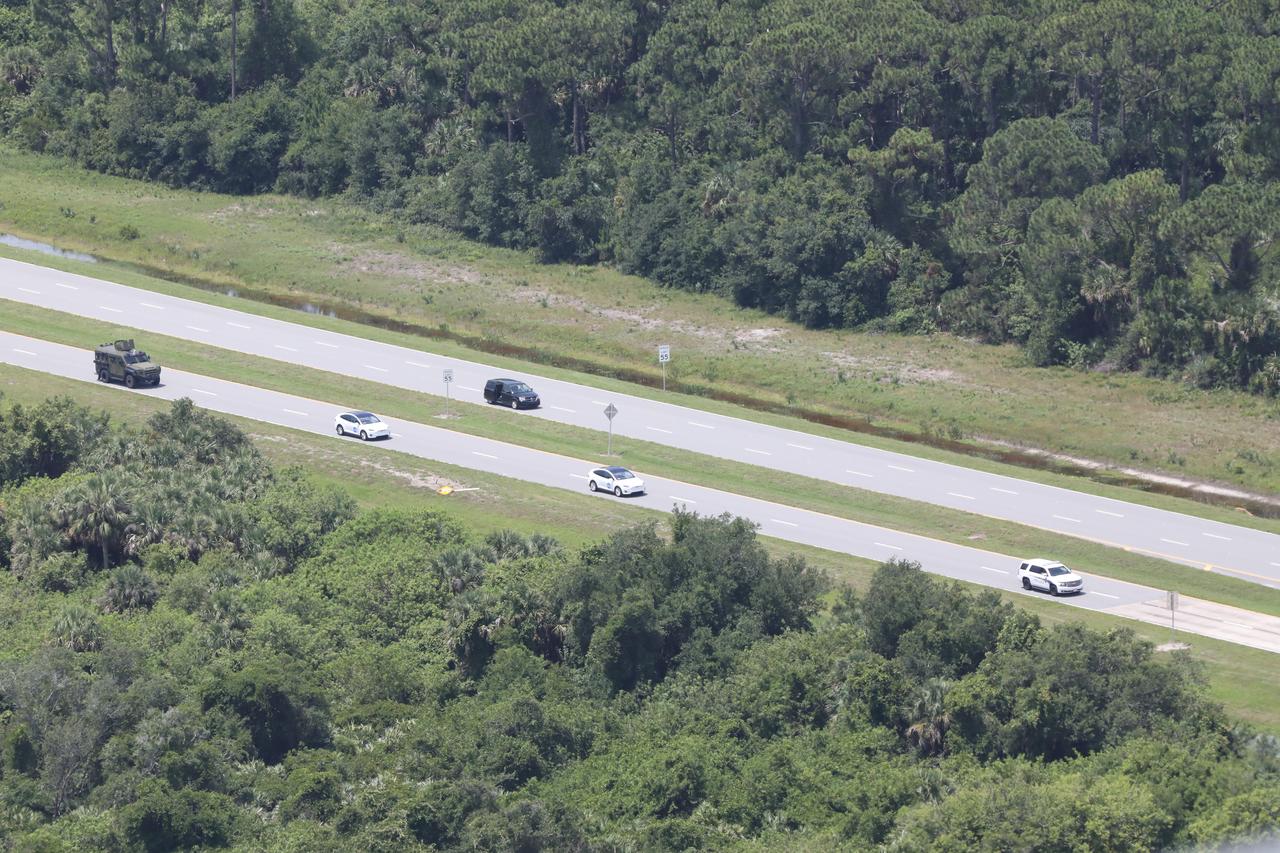 NASA astronauts Robert Behnken and Douglas Hurley make the journey from the Neil A. Armstrong Operations and Checkout Building to historic Launch Complex 39A at the agency’s Kennedy Space Center in Florida as they prepare to embark on NASA’s SpaceX Demo-2 mission on May 30, 2020. The astronauts are being transported to the launch pad in a Tesla Model X. Behnken and Hurley are the first astronauts to launch to the International Space Station from U.S. soil since the end of the Space Shuttle Program in 2011. Liftoff of the SpaceX Falcon 9 rocket and Crew Dragon spacecraft occurred at 3:22 p.m. EDT. Part of NASA’s Commercial Crew Program, this will be SpaceX’s final flight test, paving the way for the agency to certify the crew transportation system for regular, crewed flights to the orbiting laboratory.