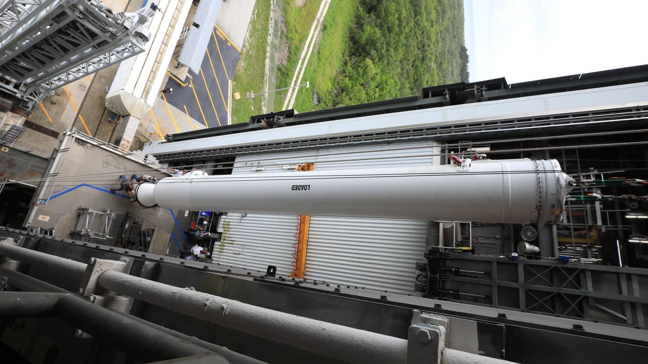 Inside the Vertical Integration Facility at Space Launch Complex 41 at Cape Canaveral Air Force Station in Florida, the second of four solid rocket boosters (SRB) for the United Launch Alliance Atlas V 541 rocket is lifted up by crane on June 3, 2020. The SRB will be mated to the Atlas V booster. NASA’s Mars 2020 mission with the Perseverance rover is scheduled to launch on July 20, 2020, atop the Atlas V rocket from Pad 41. The rover is part of NASA’s Mars Exploration Program, a long-term effort of robotic exploration of the Red Planet. The rover’s seven instruments will search for habitable conditions in the ancient past and signs of past microbial life on Mars. The Launch Services Program at Kennedy is responsible for launch management.