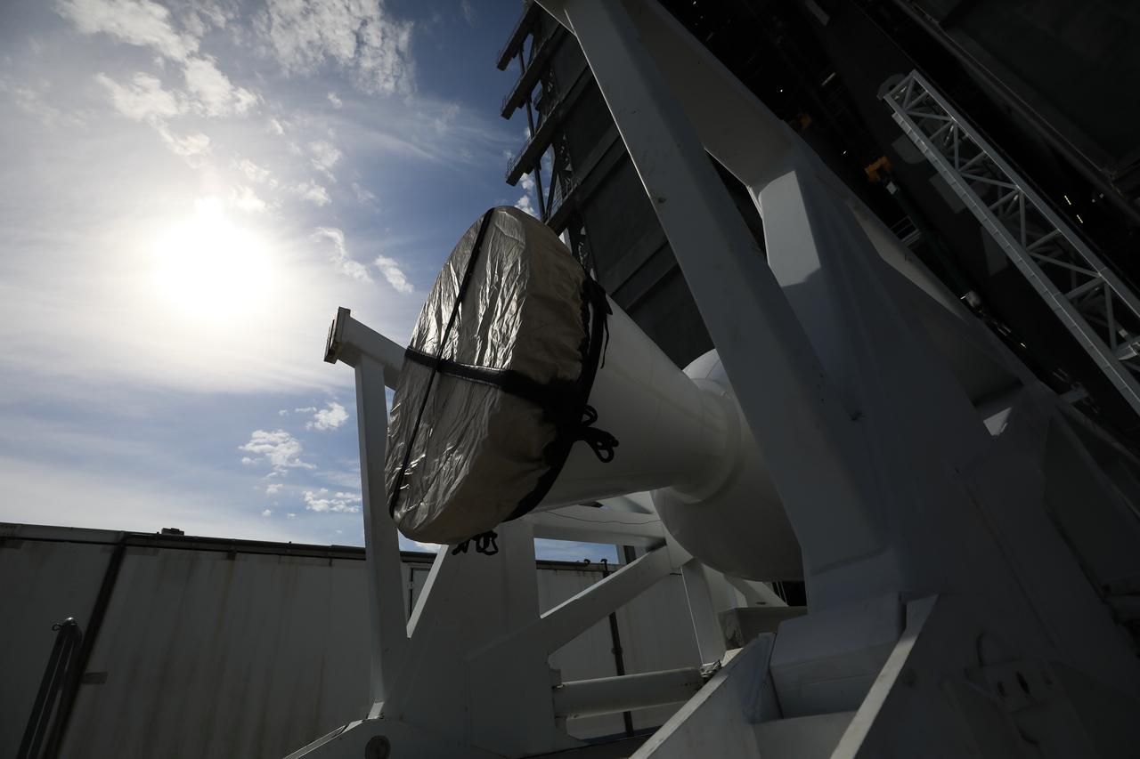 A lifting device begins to raise the third of four solid rocket boosters (SRB) for the United Launch Alliance Atlas V 541 rocket into the vertical position at Vertical Integration Facility (VIF) at Space Launch Complex 41 at Cape Canaveral Air Force Station (CCAFS) in Florida on June 8, 2020. The SRB will be lifted up and mated to the Atlas V booster in the VIF. NASA’s Mars 2020 mission with the Perseverance rover is scheduled to launch on July 20, 2020, atop the Atlas V rocket from Pad 41. The rover is part of NASA’s Mars Exploration Program, a long-term effort of robotic exploration of the Red Planet. The rover’s seven instruments will search for habitable conditions in the ancient past and signs of past microbial life on Mars. The Launch Services Program at Kennedy is responsible for launch management.