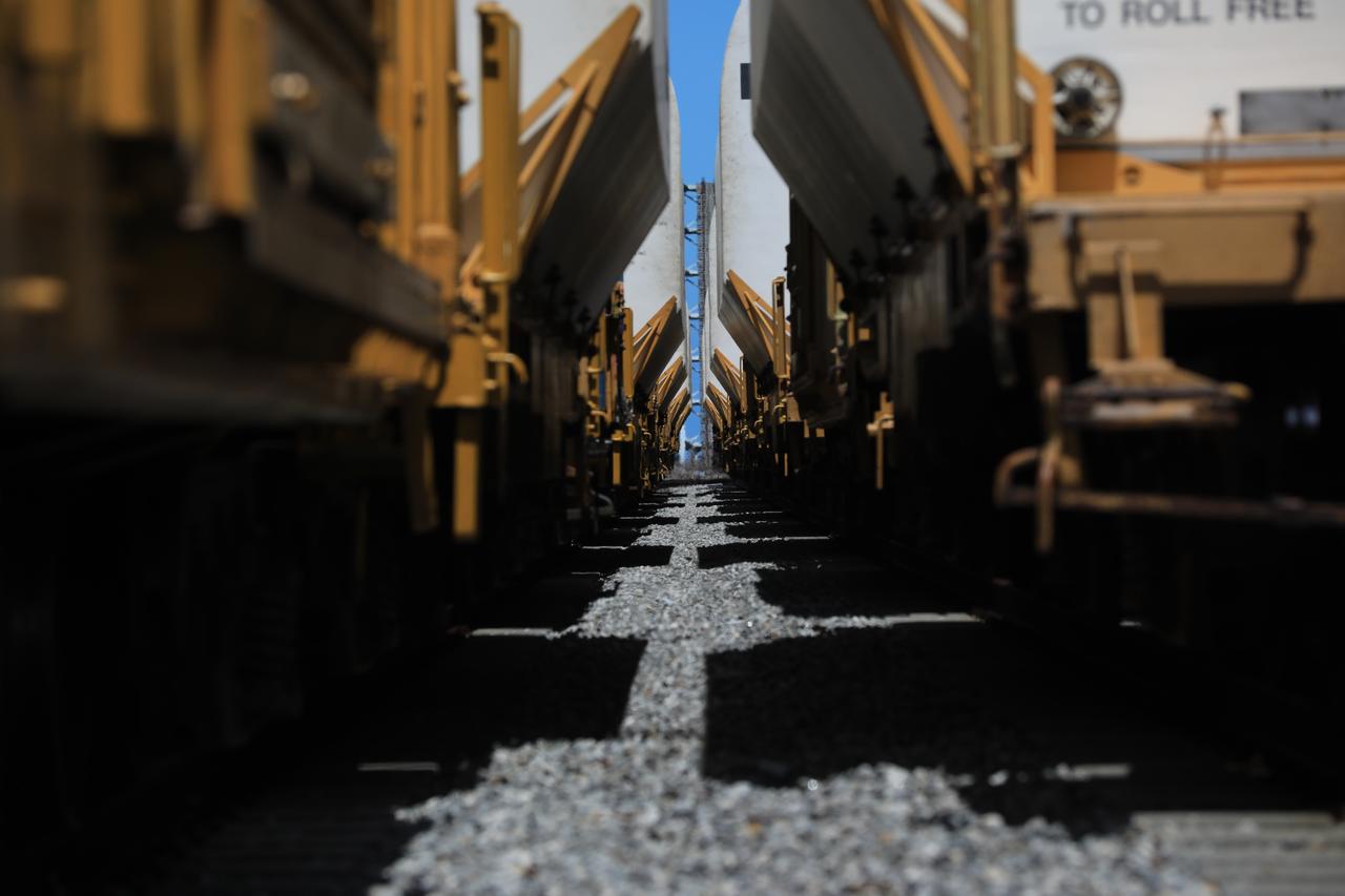The train carrying the two solid rocket boosters that will power NASA’s Space Launch System (SLS) for Artemis missions to the Moon arrives at the Jay Jay rail yard – the connecting link between Kennedy Space Center and the Florida East Coast railway – in Titusville, Florida, on June 12, 2020. The boosters, each comprised of five motor segments, traveled from a Northrop Grumman manufacturing facility in Promontory, Utah, to Kennedy’s Rotation, Processing and Surge Facility, where teams with NASA’s Exploration Ground Systems will process the segments before moving them to the Vehicle Assembly Building for stacking on the mobile launcher. Under the Artemis program, NASA will land the first woman and the next man on the Moon by 2024. The first in a series of increasingly complex missions, Artemis I will test the Orion spacecraft and SLS as an integrated system ahead of crewed flights to the Moon.  