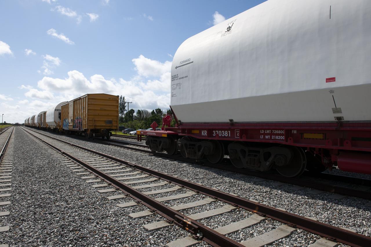 Twin rocket boosters for NASA’s Space Launch System (SLS) that will power Artemis missions to the Moon have arrived at the agency’s Kennedy Space Center in Florida. The two motor segments, each comprised of five segments, arrived at Kennedy’s Rotation, Processing and Surge Facility (RPSF) on June 15, 2020, by train from a Northrop Grumman manufacturing facility in Promontory, Utah. The booster segments will remain in the RPSF for inspection prior to processing until it’s time to move them to the Vehicle Assembly Building for stacking on the mobile launcher. This is the first piece of flight hardware to arrive at Kennedy by train for the Artemis program, but NASA’s Exploration Ground Systems (EGS) can expect to receive additional hardware soon, including the Launch Vehicle Service Adapter and the rocket’s core stage. NASA is working toward an Artemis I launch date in 2021, keeping the program moving at the best possible pace toward the earliest possible opportunity.  