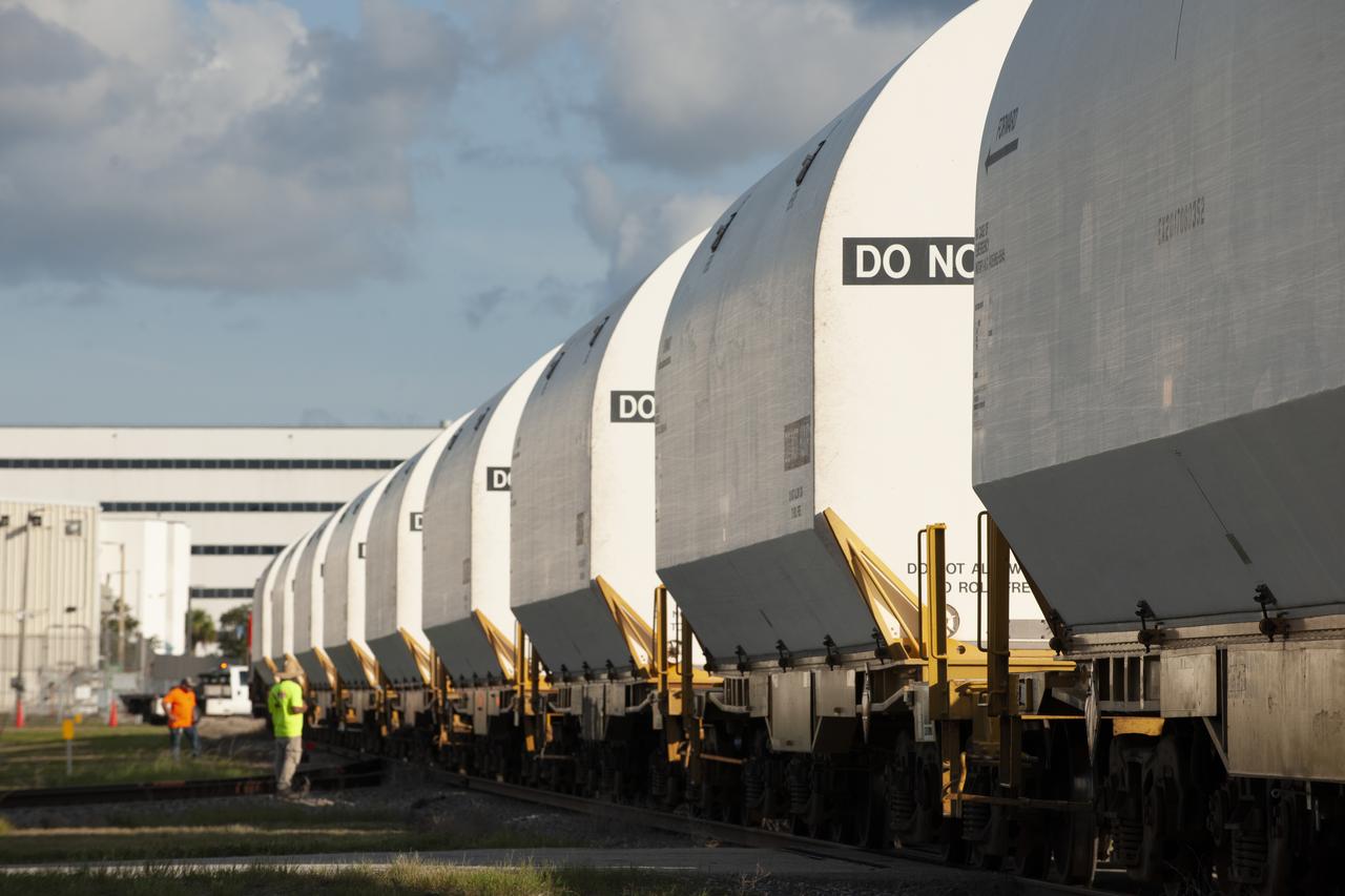 Twin rocket boosters for NASA’s Space Launch System (SLS) that will power Artemis missions to the Moon have arrived at the agency’s Kennedy Space Center in Florida. The two motor segments, each comprised of five segments, arrived at Kennedy’s Rotation, Processing and Surge Facility (RPSF) on June 15, 2020, by train from a Northrop Grumman manufacturing facility in Promontory, Utah. The booster segments will remain in the RPSF for inspection prior to processing until it’s time to move them to the Vehicle Assembly Building for stacking on the mobile launcher. This is the first piece of flight hardware to arrive at Kennedy by train for the Artemis program, but NASA’s Exploration Ground Systems (EGS) can expect to receive additional hardware soon, including the Launch Vehicle Service Adapter and the rocket’s core stage. NASA is working toward an Artemis I launch date in 2021, keeping the program moving at the best possible pace toward the earliest possible opportunity.