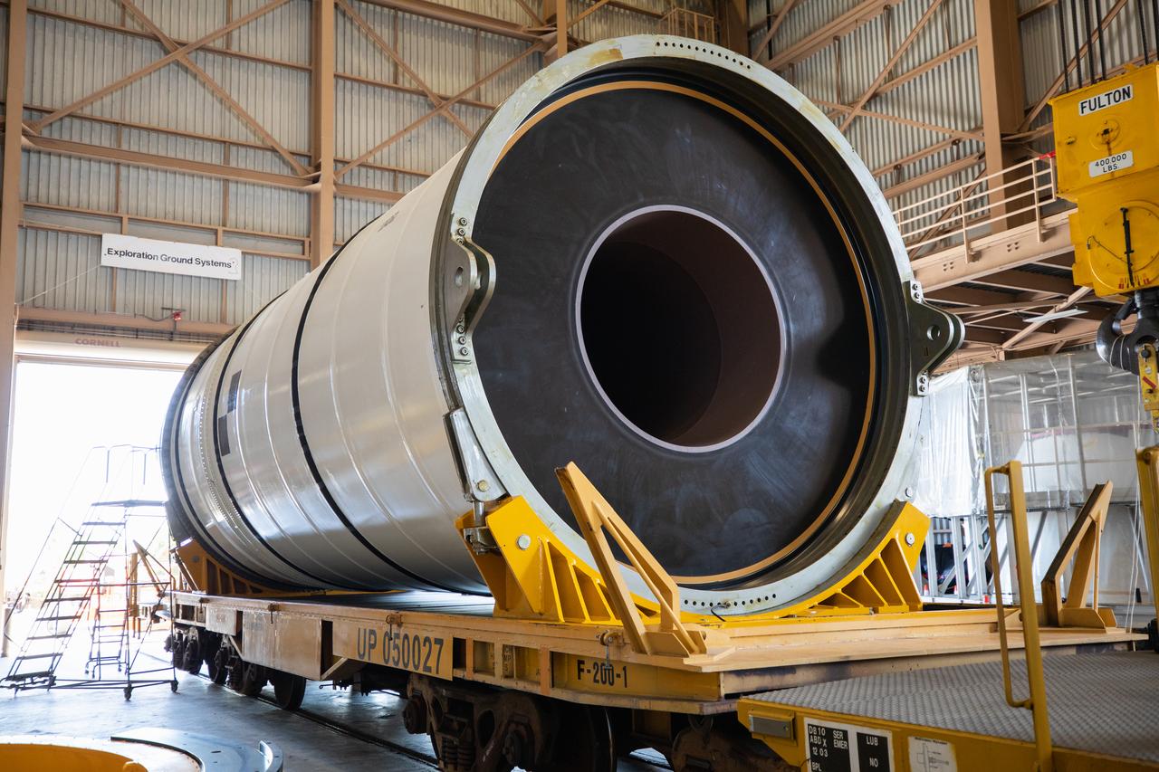Two NASA Space Launch System (SLS) solid rocket boosters are readied for mating to the rocket’s two aft skirts on June 16, 2020, inside Kennedy Space Center’s Rotation, Processing and Surge Facility. Together, the twin boosters provide more than 75 percent of the total SLS thrust at launch. Manufactured by Northrop Grumman in Promontory, Utah, the boosters arrived at Kennedy via train. The cross-country journey was an important milestone for the agency’s Artemis I launch. The first in a series of increasingly complex missions, Artemis I will test the Orion spacecraft and SLS as an integrated system prior to crewed missions to the Moon. Once the boosters are mated with the aft skirts, they will be moved to the Vehicle Assembly Building for stacking on the mobile launcher.