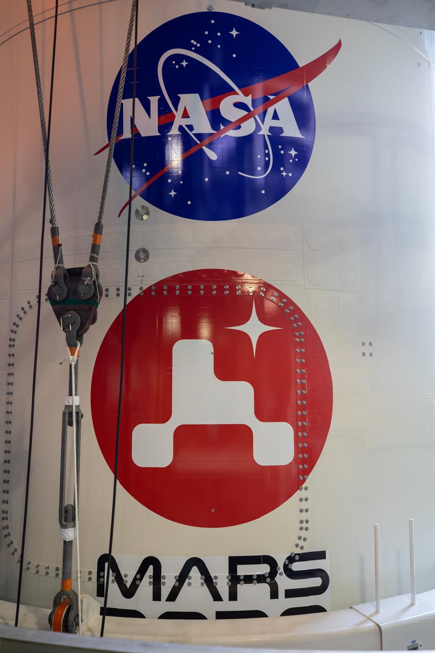 A close-up view of the United Launch Alliance (ULA) payload fairing with NASA’s Mars 2020 Perseverance rover inside in the Vertical Integration Facility (VIF) at Space Launch Complex 41 at Cape Canaveral Air Force Station in Florida on July 7, 2020. The payload fairing is being secured on the ULA Atlas V rocket. The Mars Perseverance rover is scheduled to launch atop the Atlas V 541 rocket from Pad 41 on July 30. The rover is part of NASA’s Mars Exploration Program, a long-term effort of robotic exploration of the Red Planet. The rover’s seven instruments will search for habitable conditions in the ancient past and signs of past microbial life on Mars. The Launch Services Program at Kennedy is responsible for launch management.