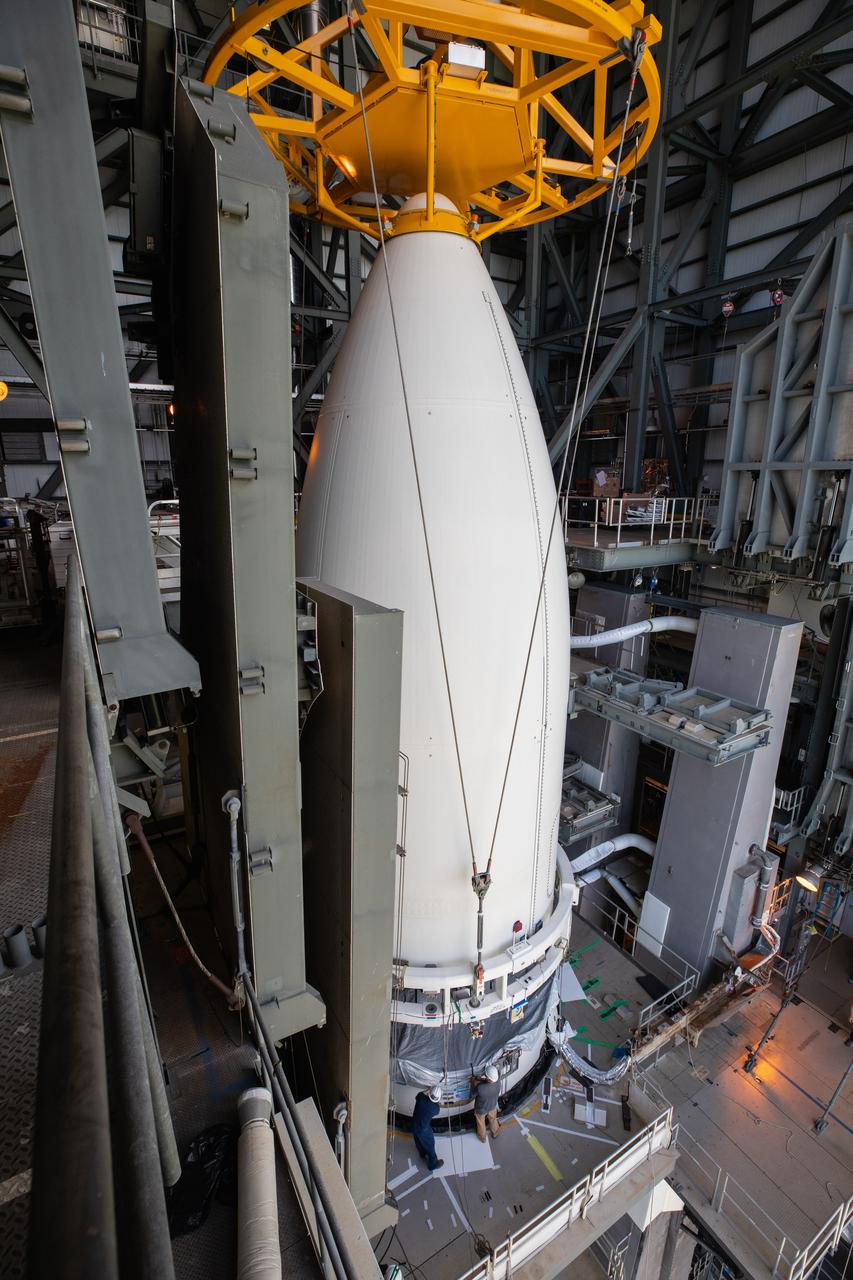 Inside the Vertical Integration Facility (VIF) at Space Launch Complex 41 at Cape Canaveral Air Force Station in Florida, the United Launch Alliance (ULA) payload fairing with NASA’s Mars 2020 Perseverance rover inside is secured on top of the ULA Atlas V rocket on July 7, 2020. The Mars Perseverance rover is scheduled to launch atop the Atlas V 541 rocket from Pad 41 on July 30. The rover is part of NASA’s Mars Exploration Program, a long-term effort of robotic exploration of the Red Planet. The rover’s seven instruments will search for habitable conditions in the ancient past and signs of past microbial life on Mars. The Launch Services Program at Kennedy is responsible for launch management.