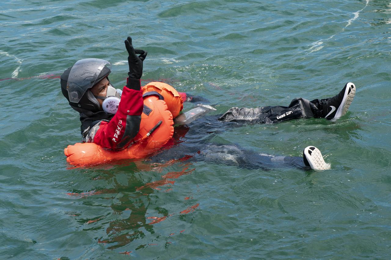 NASA astronaut Victor Glover, and pilot for the agency’s SpaceX Crew-1 mission, participates in an egress training exercise on July 21, 2020, in Florida. The exercise involved simulating an emergency situation after splashdown of the Crew Dragon spacecraft. Mission specialist Shannon Walker and spacecraft commander Michael Hopkins – both NASA astronauts – also participated in the training, along with Soichi Noguchi, mission specialist and Japan Aerospace Exploration Agency (JAXA) astronaut. Glover, Walker, Hopkins, and Noguchi will launch to the International Space Station from Launch Complex 39A at the agency’s Kennedy Space Center in Florida. Crew-1 will be the first operational mission to the orbiting laboratory under NASA’s Commercial Crew Program, following the agency’s certification of SpaceX’s crew transportation system.