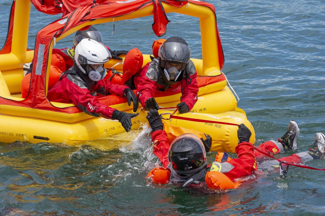 Crew Dragon commander Michael Hopkins, pilot Victor Glover, mission specialist Shannon Walker – all NASA astronauts – and Japan Aerospace Exploration Agency (JAXA) astronaut and mission specialist Soichi Noguchi participate in an egress training exercise on July 21, 2020, in preparation for NASA’s SpaceX Crew-1 mission. The exercise involved simulating an emergency situation after splashdown of the Crew Dragon spacecraft. Hopkins, Glover, Walker, and Noguchi will launch to the International Space Station from Launch Complex 39A at the agency’s Kennedy Space Center in Florida. Crew-1 will be the first operational mission to the orbiting laboratory under NASA’s Commercial Crew Program, following the agency’s certification of SpaceX’s crew transportation system.