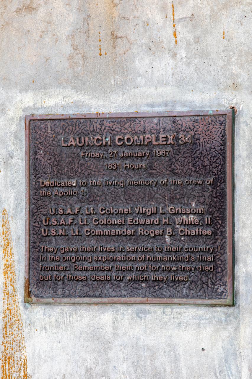 A close-up view of the historic marker on the launch pedestal still standing at Launch Complex 34 at Cape Canaveral Space Force Station in Florida on July 22, 2020. Work will soon begin to perform environmental contamination removal on the pedestal and the ground area surrounding the launch complex.
