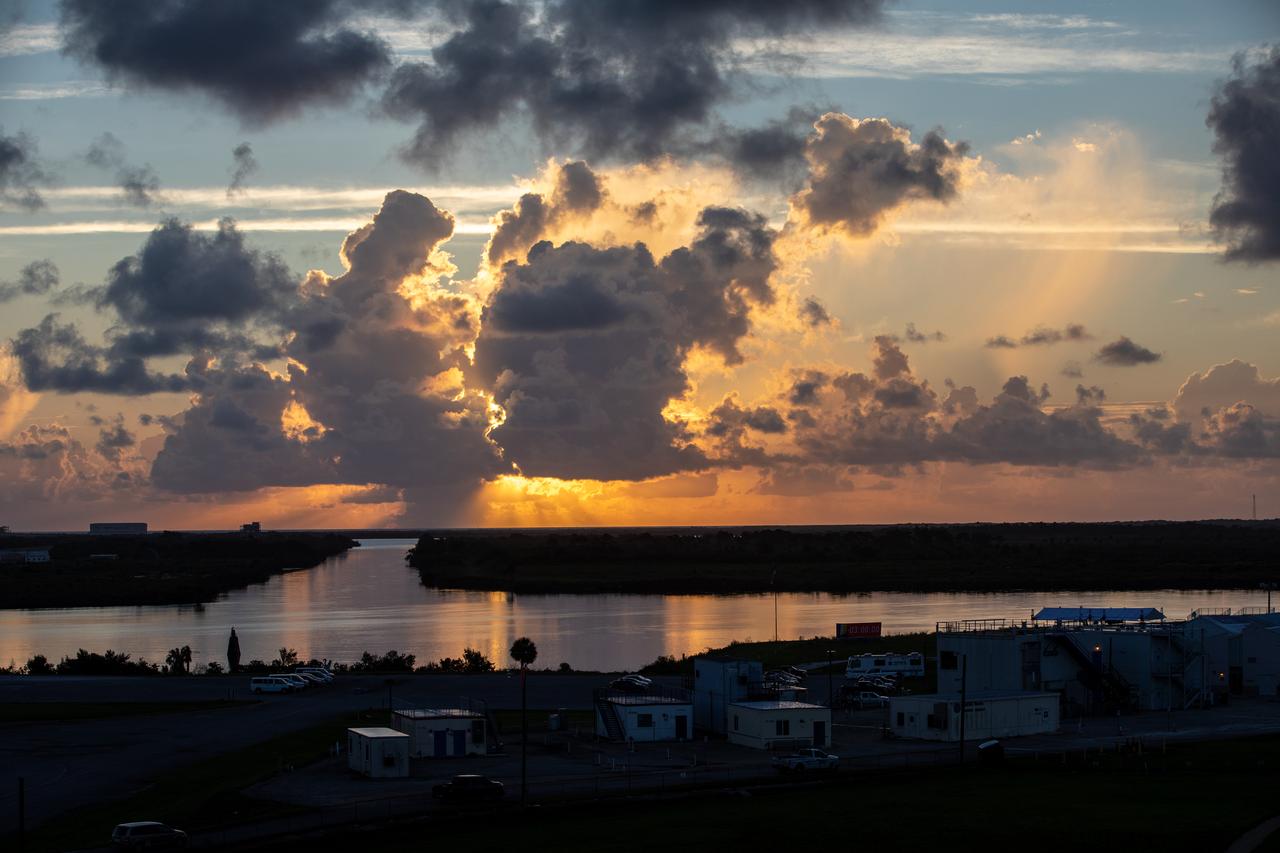 An early sunrise view of a waterway surrounding Launch Complex 39 at NASA's Kennedy Space Center in Florida on July 25, 2020. NASA’s Space Launch System and Orion spacecraft will lift off from Launch Complex 39B on Artemis I, an uncrewed mission around the Moon.