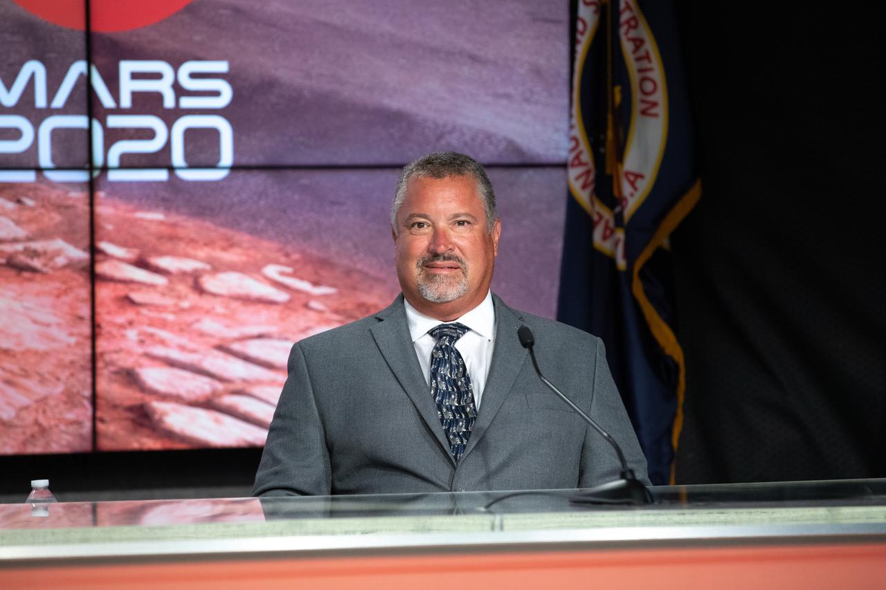 Launch Director Omar Baez, with NASA’s Launch Services Program, participates in a Mars 2020 prelaunch news briefing at NASA’s Kennedy Space Center in Florida on July 27, 2020. The Mars Perseverance rover is scheduled to launch on July 30, on a United Launch Alliance Atlas V 541 rocket from Space Launch Complex 41 at nearby Cape Canaveral Air Force Station. The rover is part of NASA’s Mars Exploration Program, a long-term effort of robotic exploration of the Red Planet. The rover will search for habitable conditions in the ancient past and signs of past microbial life on Mars. The Launch Services Program at Kennedy is responsible for launch management.