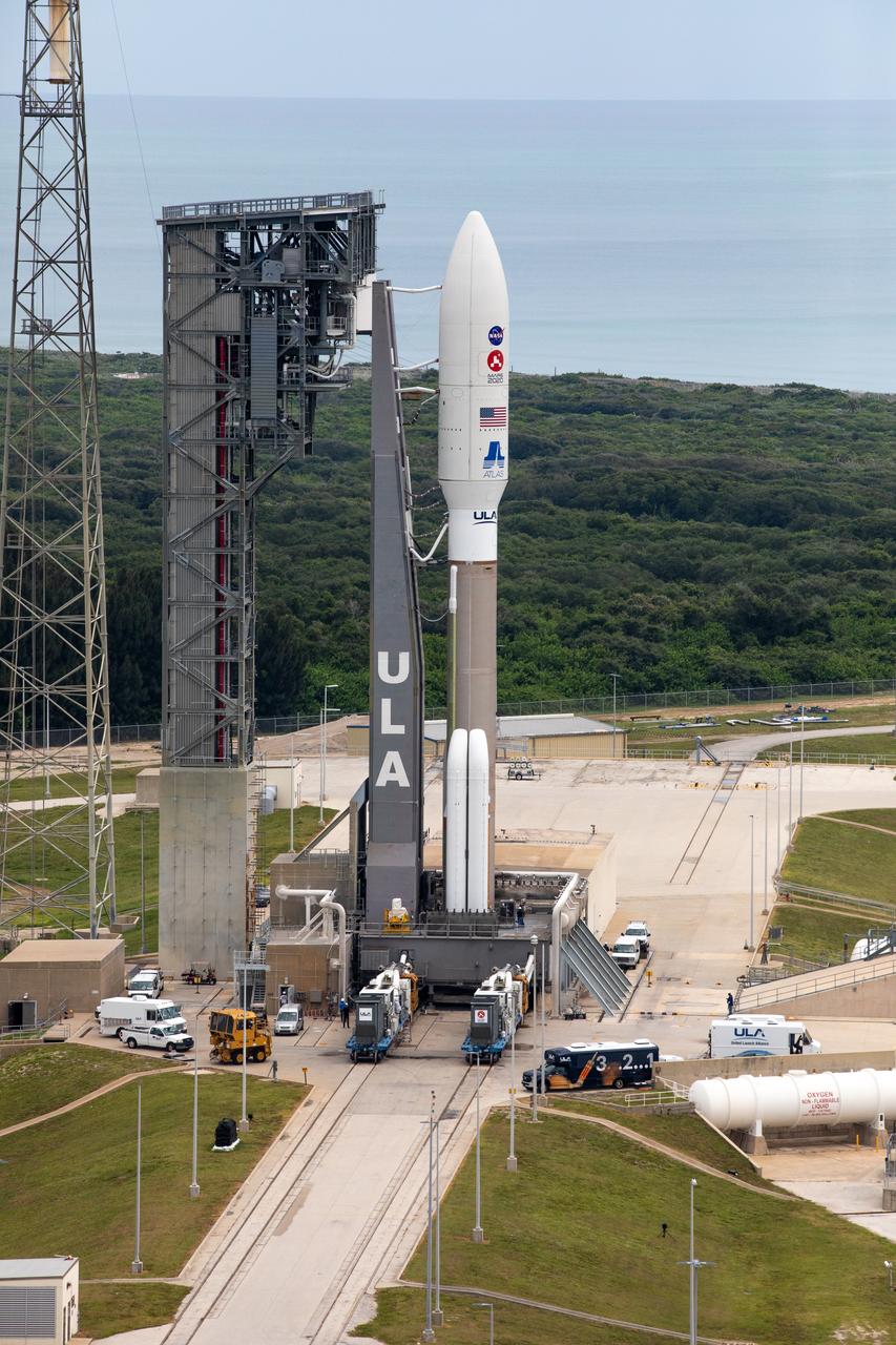 The United Launch Alliance Atlas V 541 rocket, carrying NASA’s Mars Perseverance rover and Ingenuity helicopter, arrives at the launch pad at Space Launch Complex 41 at Cape Canaveral Air Force Station on July 28, 2020. First motion from the Vertical Integration Facility was at 10:24 a.m. EDT. Launch of the Mars 2020 mission is scheduled for July 30. The rover is part of NASA’s Mars Exploration Program, a long-term effort of robotic exploration of the Red Planet. The rover will search for habitable conditions in the ancient past and signs of past microbial life on Mars. The Launch Services Program at Kennedy is responsible for launch management.