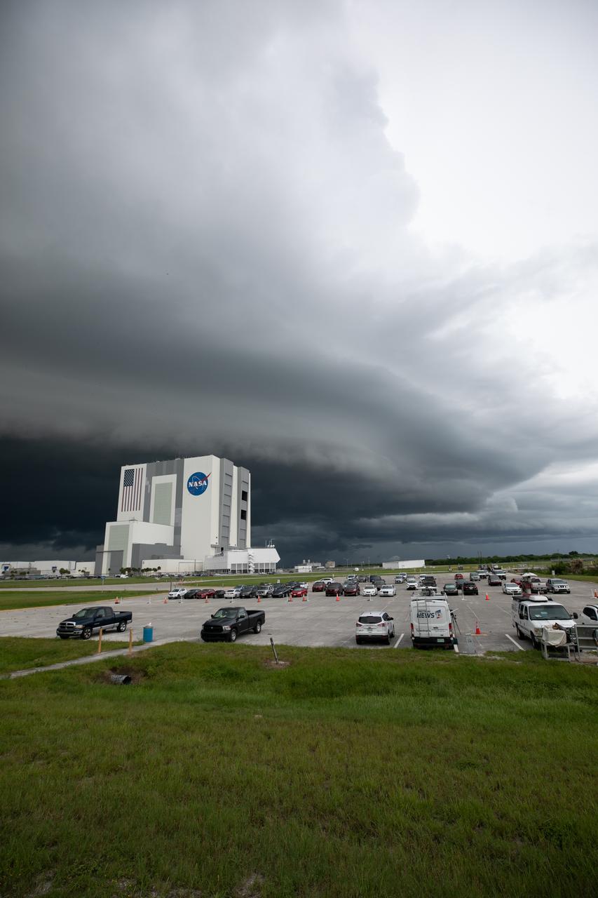 Storm clouds roll in over the Vehicle Assembly Building (VAB) at NASA’s Kennedy Space Center in Florida on July 28, 2020. Standing at 525 feet tall, this iconic landmark at Kennedy is capable of hosting multiple varieties of rockets and spacecraft at the same time. Currently, the VAB is being utilized to process and assemble the agency’s Space Launch System (SLS) rocket for Artemis missions to the Moon and beyond to Mars. Artemis I – the first launch under the agency’s Artemis Program – will test SLS and Orion as an integrated system prior to crewed flights to the Moon.