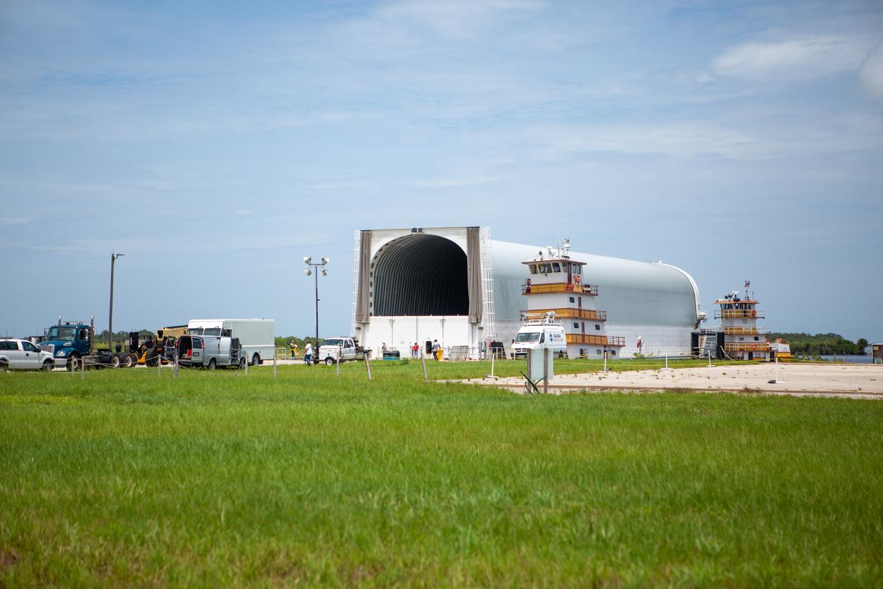 NASA’s Pegasus barge, carrying the launch vehicle stage adapter (LVSA) for the agency’s Space Launch System (SLS) rocket, arrives at the Kennedy Space Center Launch Complex 39 turn basin wharf on July 29, 2020. Traveling to Florida from NASA’s Marshall Space Flight Center in Huntsville, Alabama, the LVSA will connect the SLS core stage to the rocket’s upper stage for the Artemis I launch. Once the LVSA is offloaded, it will be moved to High Bay 4 in the Vehicle Assembly Building for processing ahead of launch. The first launch under the agency’s Artemis program, Artemis I will test SLS and the Orion spacecraft as an integrated system prior to crewed flights to the Moon.