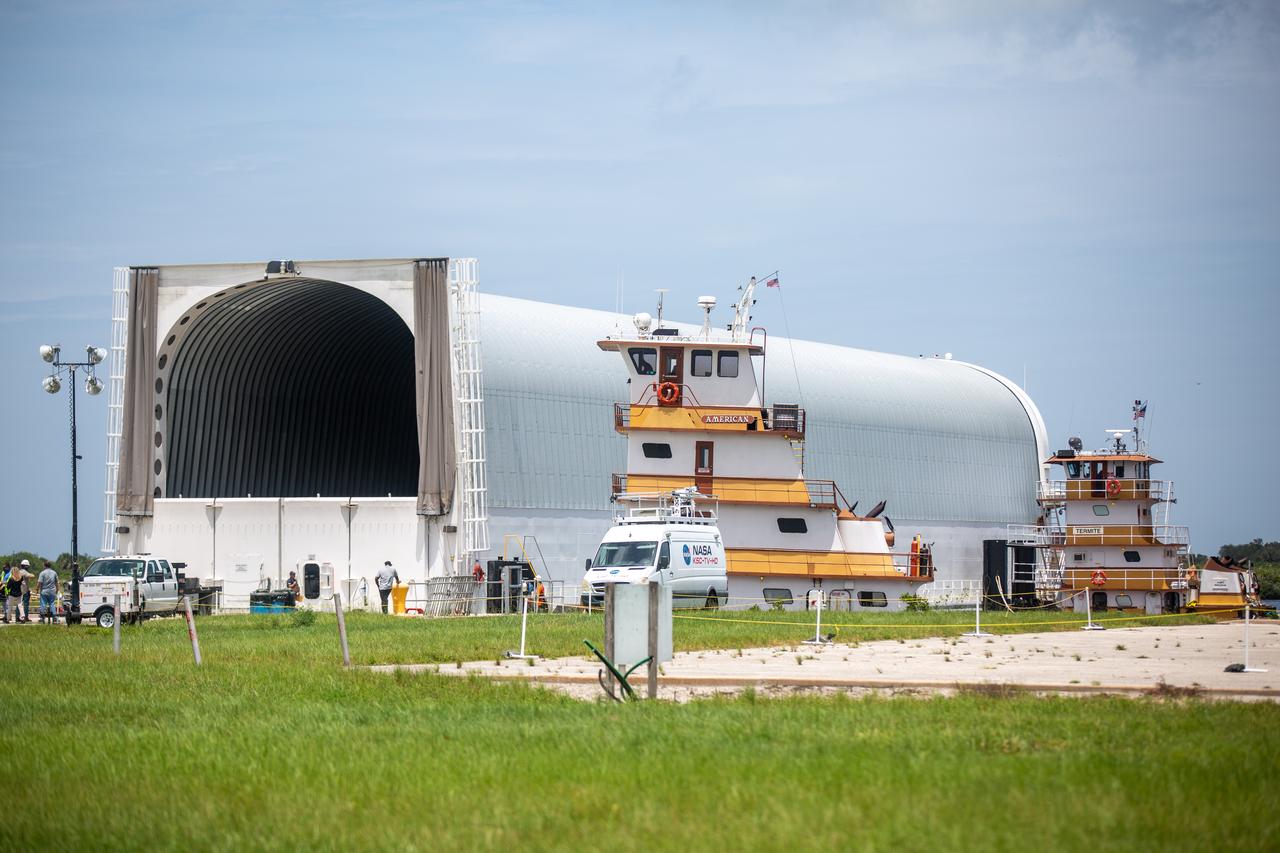 NASA’s Pegasus barge, carrying the launch vehicle stage adapter (LVSA) for the agency’s Space Launch System (SLS) rocket, arrives at the Kennedy Space Center Launch Complex 39 turn basin wharf on July 29, 2020. Traveling to Florida from NASA’s Marshall Space Flight Center in Huntsville, Alabama, the LVSA will connect the SLS core stage to the rocket’s upper stage for the Artemis I launch. Once the LVSA is offloaded, it will be moved to High Bay 4 in the Vehicle Assembly Building for processing ahead of launch. The first launch under the agency’s Artemis program, Artemis I will test SLS and the Orion spacecraft as an integrated system prior to crewed flights to the Moon.