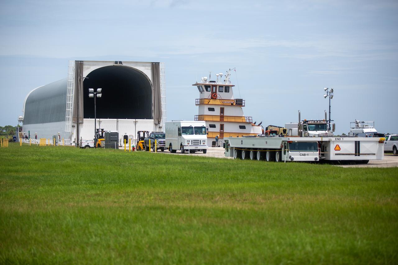NASA’s Pegasus barge, carrying the launch vehicle stage adapter (LVSA) for the agency’s Space Launch System (SLS) rocket, arrives at the Kennedy Space Center Launch Complex 39 turn basin wharf on July 29, 2020. Traveling to Florida from NASA’s Marshall Space Flight Center in Huntsville, Alabama, the LVSA will connect the SLS core stage to the rocket’s upper stage for the Artemis I launch. Once the LVSA is offloaded, it will be moved to High Bay 4 in the Vehicle Assembly Building for processing ahead of launch. The first launch under the agency’s Artemis program, Artemis I will test SLS and the Orion spacecraft as an integrated system prior to crewed flights to the Moon.