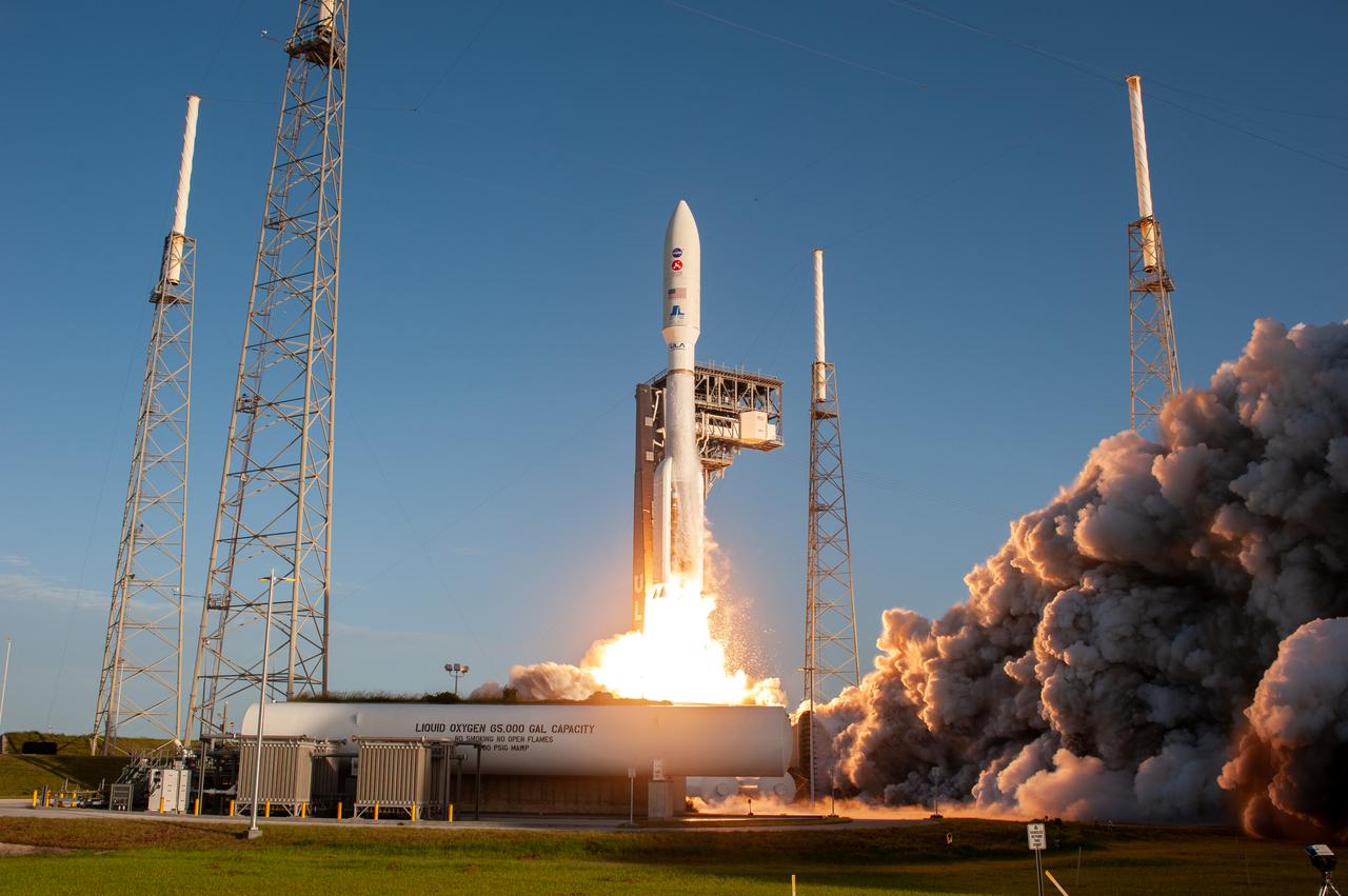 With blue sky as a backdrop, a United Launch Alliance Atlas V 541 rocket lifts off from Space Launch Complex 41 at Cape Canaveral Air Force Station in Florida on July 30, 2020, at 7:50 a.m. EDT, carrying NASA’s Mars Perseverance rover and Ingenuity helicopter. The rover is part of NASA’s Mars Exploration Program, a long-term effort of robotic exploration of the Red Planet. The rover’s seven instruments will search for habitable conditions in the ancient past and signs of past microbial life on Mars. The Launch Services Program at Kennedy is responsible for launch management. 