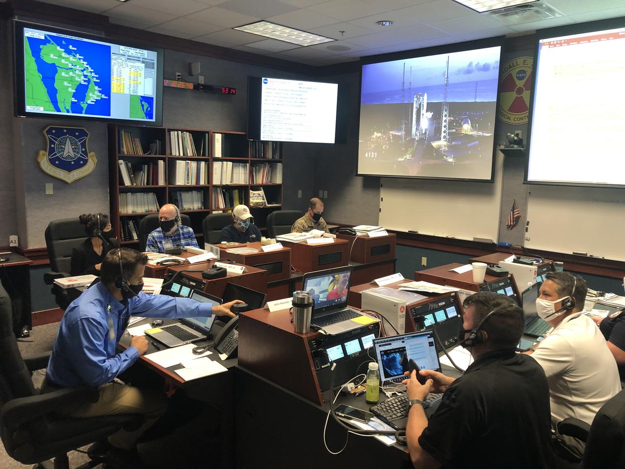 Joint Information Center (JIC), Emergency Operations Center (EOC) and Radiation Control Center (RADCC) members prepare for the launch of NASA’s Mars 2020 Perseverance rover and Ingenuity helicopter on July 30, 2020, at the agency’s Kennedy Space Center in Florida. JIC members include representatives on the local, regional and national level. Mars 2020 launched on a United Launch Alliance Atlas V 541 rocket from Space Launch Complex 41 at nearby Cape Canaveral Air Force Station. Liftoff was at 7:50 a.m. EDT. The rover is part of NASA’s Mars Exploration Program, a long-term effort of robotic exploration of the Red Planet. The rover will search for habitable conditions in the ancient past and signs of past microbial life on Mars. The Launch Services Program at Kennedy is responsible for launch management.