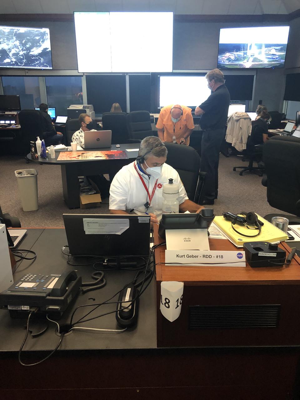 Joint Information Center (JIC), Emergency Operations Center (EOC) and Radiation Control Center (RADCC) members prepare for the launch of NASA’s Mars 2020 Perseverance rover and Ingenuity helicopter on July 30, 2020, at the agency’s Kennedy Space Center in Florida. JIC members include representatives on the local, regional and national level. Mars 2020 launched on a United Launch Alliance Atlas V 541 rocket from Space Launch Complex 41 at nearby Cape Canaveral Air Force Station. Liftoff was at 7:50 a.m. EDT. The rover is part of NASA’s Mars Exploration Program, a long-term effort of robotic exploration of the Red Planet. The rover will search for habitable conditions in the ancient past and signs of past microbial life on Mars. The Launch Services Program at Kennedy is responsible for launch management.