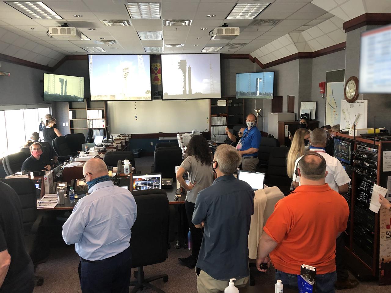 Joint Information Center (JIC), Emergency Operations Center (EOC) and Radiation Control Center (RADCC) members prepare for the launch of NASA’s Mars 2020 Perseverance rover and Ingenuity helicopter on July 30, 2020, at the agency’s Kennedy Space Center in Florida. JIC members include representatives on the local, regional and national level. Mars 2020 launched on a United Launch Alliance Atlas V 541 rocket from Space Launch Complex 41 at nearby Cape Canaveral Air Force Station. Liftoff was at 7:50 a.m. EDT. The rover is part of NASA’s Mars Exploration Program, a long-term effort of robotic exploration of the Red Planet. The rover will search for habitable conditions in the ancient past and signs of past microbial life on Mars. The Launch Services Program at Kennedy is responsible for launch management.