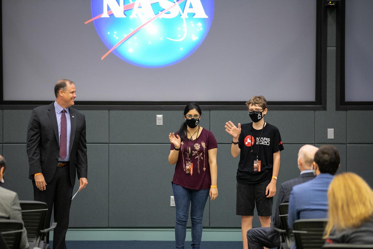 NASA Administrator Jim Bridenstine participates in a Mars 2020 VIP briefing at the Operations and Support Building II at NASA’s Kennedy Space Center in Florida on July 30, 2020. Also joining him are students Vaneeza Rupani and Alex Mather. Rupani named the Ingenuity helicopter, and Mather named the Perseverance rover. The briefing took place before launch of the rover and helicopter on a United Launch Alliance Atlas V 541 rocket from Space Launch Complex 41 at nearby Cape Canaveral Air Force Station. Liftoff occurred at 7:50 a.m. EDT. The rover is part of NASA’s Mars Exploration Program, a long-term effort of robotic exploration of the Red Planet. The rover will search for habitable conditions in the ancient past and signs of past microbial life on Mars. The Launch Services Program at Kennedy is responsible for launch management.