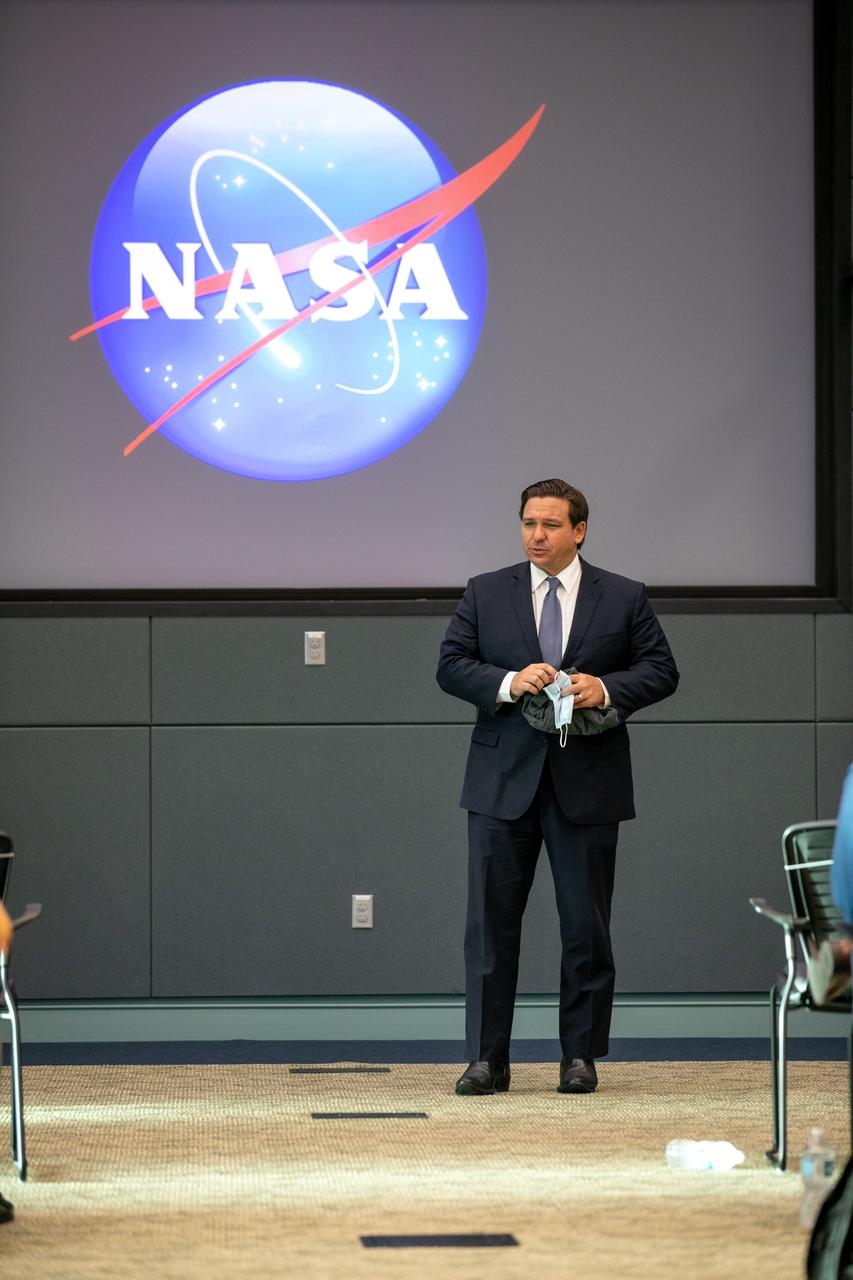 Ron DeSantis, Florida Governor, participates in a Mars 2020 VIP briefing at the Operations and Support Building II at NASA’s Kennedy Space Center in Florida on July 30, 2020, before launch of the Mars Perseverance rover and Ingenuity helicopter on a United Launch Alliance Atlas V 541 rocket from Space Launch Complex 41 at nearby Cape Canaveral Air Force Station. Liftoff occurred at 7:50 a.m. The rover is part of NASA’s Mars Exploration Program, a long-term effort of robotic exploration of the Red Planet. The rover will search for habitable conditions in the ancient past and signs of past microbial life on Mars. The Launch Services Program at Kennedy is responsible for launch management.
