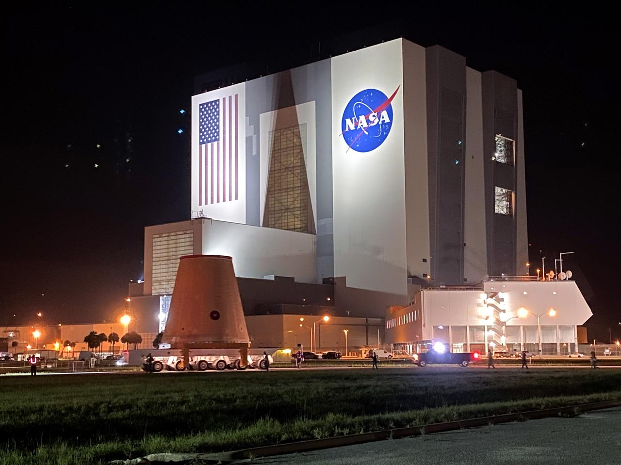 Technicians with NASA’s Exploration Ground Systems move the launch vehicle stage adapter (LVSA) for the agency’s Space Launch System (SLS) rocket to the Vehicle Assembly Building (VAB) on July 30, 2020, for processing. Carried by NASA’s Pegasus barge, the LVSA arrived at Kennedy Space Center’s Launch Complex 39 turn basin wharf after departing from the agency’s Marshall Space Flight Center in Huntsville, Alabama. The LVSA will connect the SLS core stage to the rocket’s upper stage and will remain in the VAB until it’s time for stacking on the mobile launcher ahead of the Artemis I launch. The first in a series of increasingly complex missions, Artemis I will test SLS and the Orion spacecraft as an integrated system prior to crewed flights to the Moon.