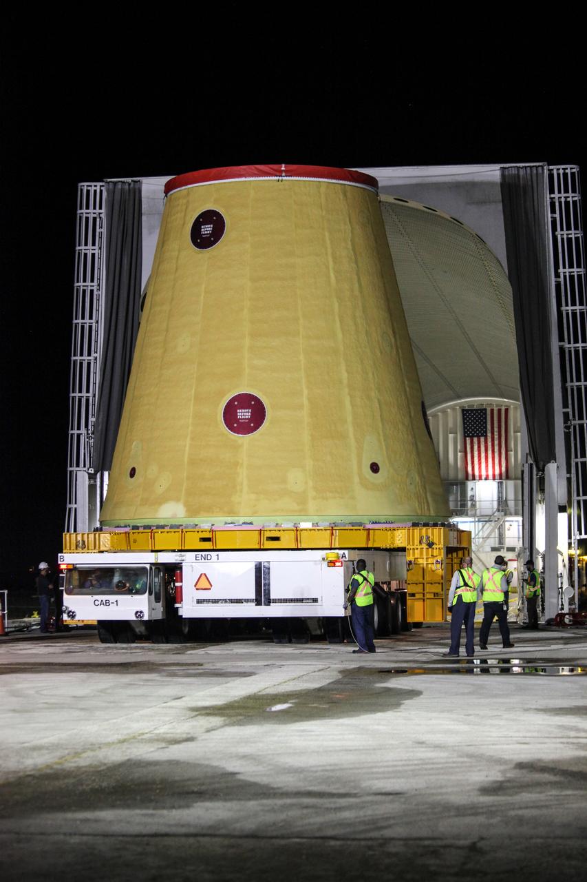 Technicians with NASA’s Exploration Ground Systems move the launch vehicle stage adapter (LVSA) for the agency’s Space Launch System (SLS) rocket off of the Pegasus barge for transportation to the Vehicle Assembly Building (VAB) at NASA’s Kennedy Space Center in Florida on July 30, 2020, for processing. The LVSA arrived at Kennedy’s Launch Complex 39 turn basin wharf after departing from the agency’s Marshall Space Flight Center in Huntsville, Alabama. The LVSA will connect the SLS core stage to the rocket’s upper stage and will remain in the VAB until it’s time for stacking on the mobile launcher ahead of the Artemis I launch. The first in a series of increasingly complex missions, Artemis I will test SLS and the Orion spacecraft as an integrated system prior to crewed flights to the Moon.