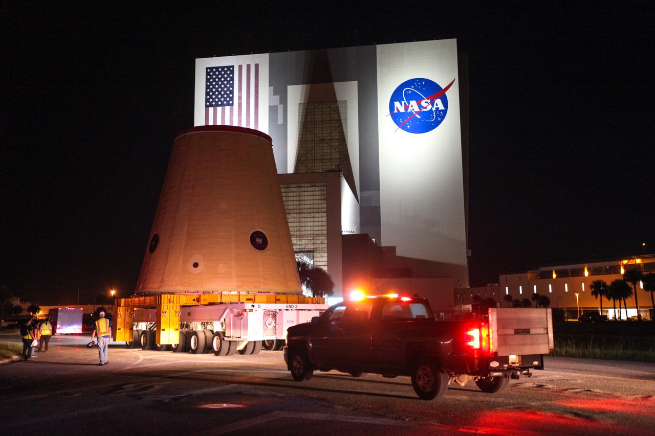 Technicians with NASA’s Exploration Ground Systems move the launch vehicle stage adapter (LVSA) for the agency’s Space Launch System (SLS) rocket to the Vehicle Assembly Building (VAB) on July 30, 2020, for processing. Carried by NASA’s Pegasus barge, the LVSA arrived at Kennedy Space Center’s Launch Complex 39 turn basin wharf after departing from the agency’s Marshall Space Flight Center in Huntsville, Alabama. The LVSA will connect the SLS core stage to the rocket’s upper stage and will remain in the VAB until it’s time for stacking on the mobile launcher ahead of the Artemis I launch. The first in a series of increasingly complex missions, Artemis I will test SLS and the Orion spacecraft as an integrated system prior to crewed flights to the Moon.