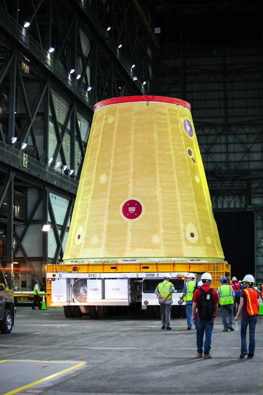 Technicians with NASA’s Exploration Ground Systems move the launch vehicle stage adapter (LVSA) for the agency’s Space Launch System (SLS) rocket into the Vehicle Assembly Building (VAB) at NASA’s Kennedy Space Center in Florida on July 30, 2020, for processing. Carried by NASA’s Pegasus barge, the LVSA arrived at Kennedy’s Launch Complex 39 turn basin wharf after departing from the agency’s Marshall Space Flight Center in Huntsville, Alabama. The LVSA will connect the SLS core stage to the rocket’s upper stage and will remain in the VAB until it’s time for stacking on the mobile launcher ahead of the Artemis I launch. The first in a series of increasingly complex missions, Artemis I will test SLS and the Orion spacecraft as an integrated system prior to crewed flights to the Moon.