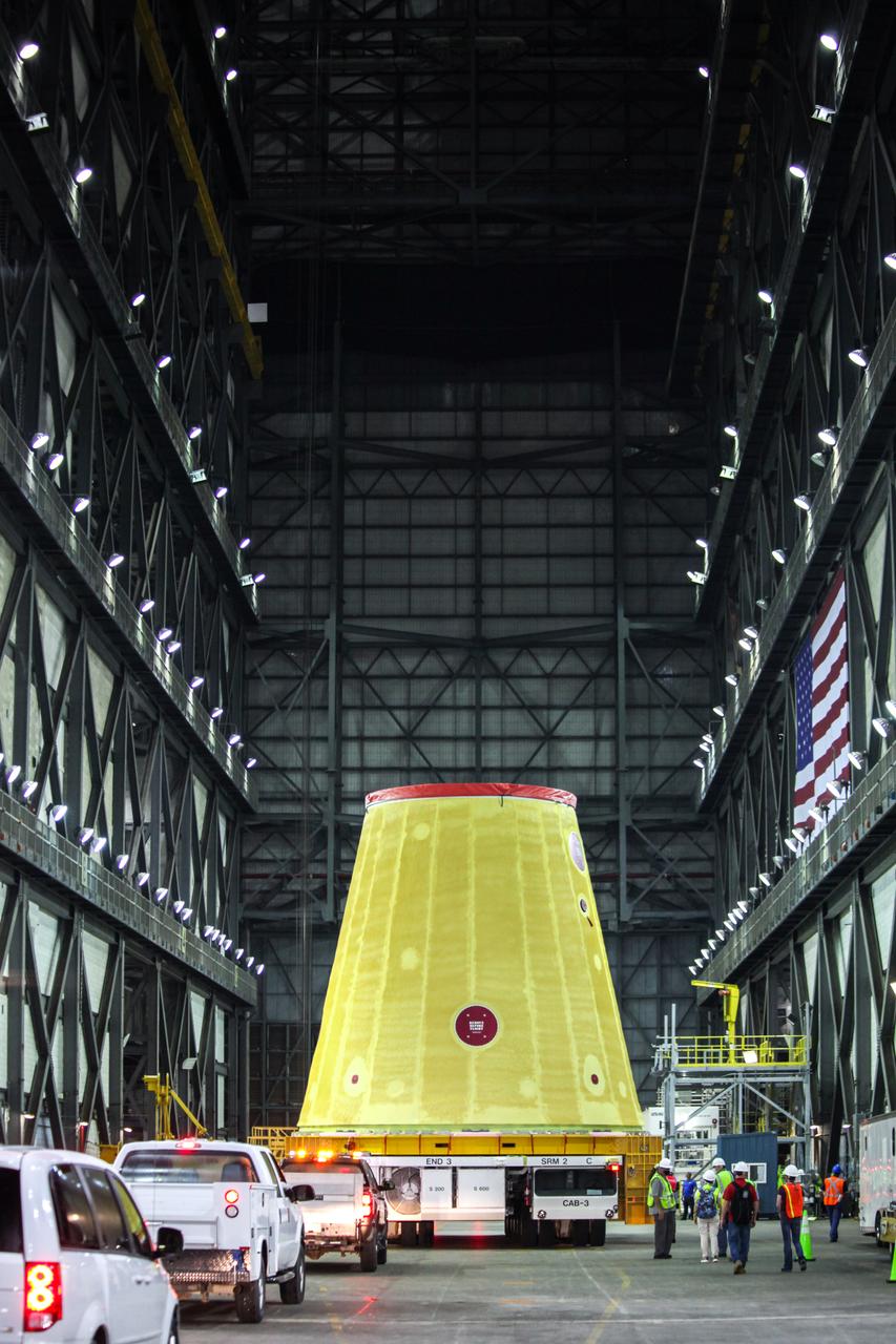 The launch vehicle stage adapter (LVSA) for NASA’s Space Launch System (SLS) rocket is moved into the Vehicle Assembly Building (VAB) at the agency’s Kennedy Space Center in Florida on July 30, 2020, for processing. Carried by NASA’s Pegasus barge, the LVSA arrived at Kennedy’s Launch Complex 39 turn basin wharf after departing from the agency’s Marshall Space Flight Center in Huntsville, Alabama. The LVSA will connect the SLS core stage to the rocket’s upper stage and will remain in the VAB until it’s time for stacking on the mobile launcher ahead of the Artemis I launch. The first in a series of increasingly complex missions, Artemis I will test SLS and the Orion spacecraft as an integrated system prior to crewed flights to the Moon.
